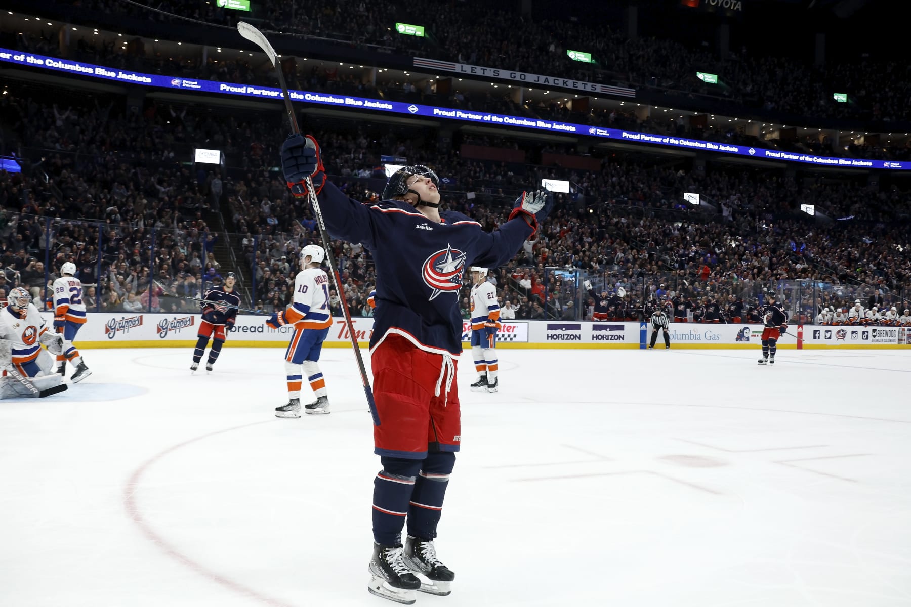 COLUMBUS, OH - MARCH 24:  Kent Johnson #91 of the Columbus Blue Jackets reacts after scoring a goal during the second period of the game against the New York Islanders at Nationwide Arena on March 24, 2023 in Columbus, Ohio. (Photo by Kirk Irwin/Getty Images)
