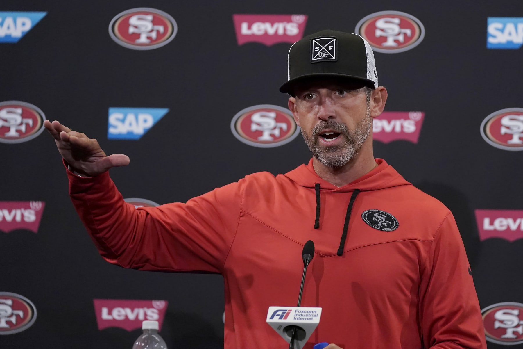 San Francisco 49ers head coach Kyle Shanahan speaks to reporters after an NFL football practice in Santa Clara, Calif., Tuesday, June 6, 2023. (AP Photo/Jeff Chiu)