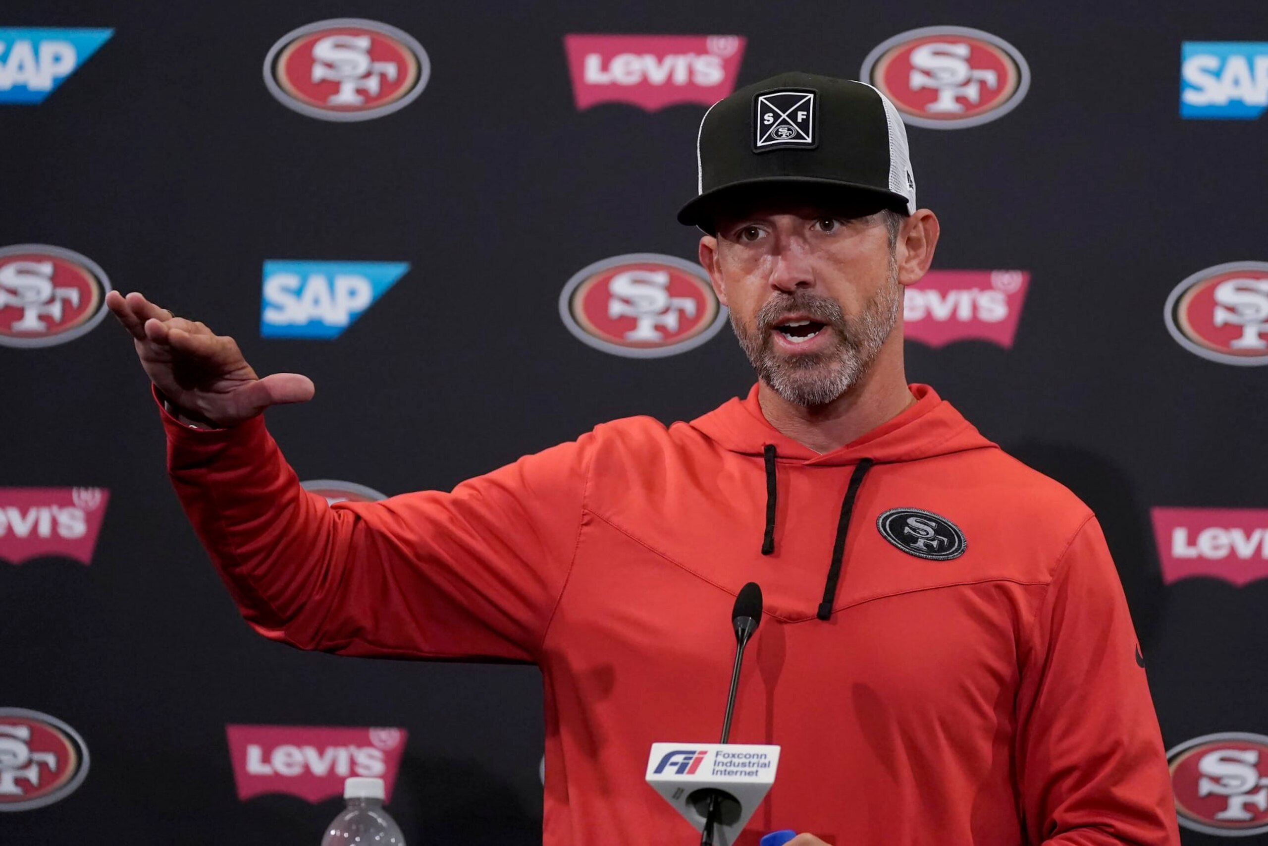 San Francisco 49ers head coach Kyle Shanahan speaks to reporters after an NFL football practice in Santa Clara, Calif., Tuesday, June 6, 2023. (AP Photo/Jeff Chiu) San Francisco 49ers head coach Kyle Shanahan speaks to reporters after an NFL football practice in Santa Clara, Calif., Tuesday, June 6, 2023. (AP Photo/Jeff Chiu)