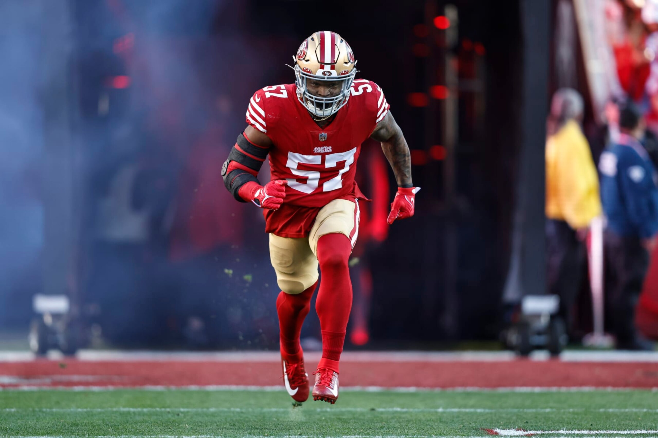 SANTA CLARA, CALIFORNIA - JANUARY 22: Dre Greenlaw #57 of the San Francisco 49ers reacts as he takes the field prior to an NFL divisional round playoff football game between the San Francisco 49ers and the Dallas Cowboys at Levi's Stadium on January 22, 2023 in Santa Clara, California. (Photo by Michael Owens/Getty Images) SANTA CLARA, CALIFORNIA - JANUARY 22: Dre Greenlaw #57 of the San Francisco 49ers reacts as he takes the field prior to an NFL divisional round playoff football game between the San Francisco 49ers and the Dallas Cowboys at Levi's Stadium on January 22, 2023 in Santa Clara, California. (Photo by Michael Owens/Getty Images)