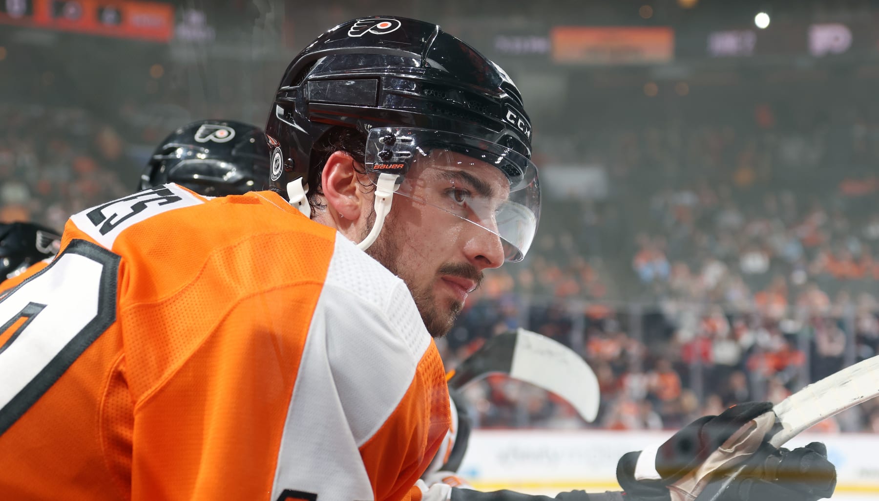 PHILADELPHIA, PENNSYLVANIA - MARCH 28:  Noah Cates #49 of the Philadelphia Flyers watches the play on the ice during the first period against the Montreal Canadiens at the Wells Fargo Center on March 28, 2023 in Philadelphia, Pennsylvania.  (Photo by Len Redkoles/NHLI via Getty Images)