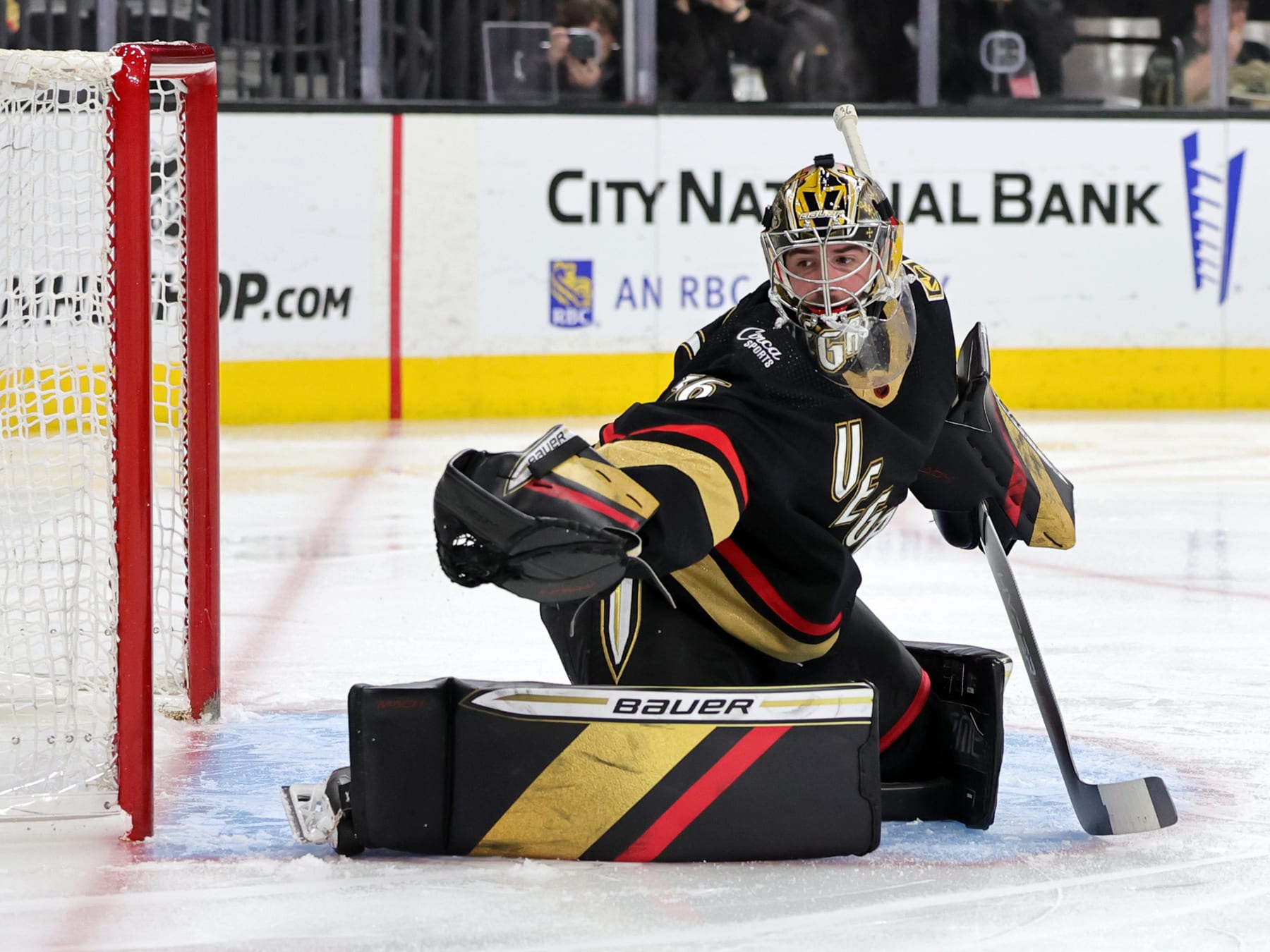 LAS VEGAS, NEVADA - JANUARY 21: Logan Thompson #36 of the Vegas Golden Knights makes a glove save against against the Washington Capitals in the third period of their game at T-Mobile Arena on January 21, 2023 in Las Vegas, Nevada. The Golden Knights defeated the Capitals 6-2. (Photo by Ethan Miller/Getty Images)