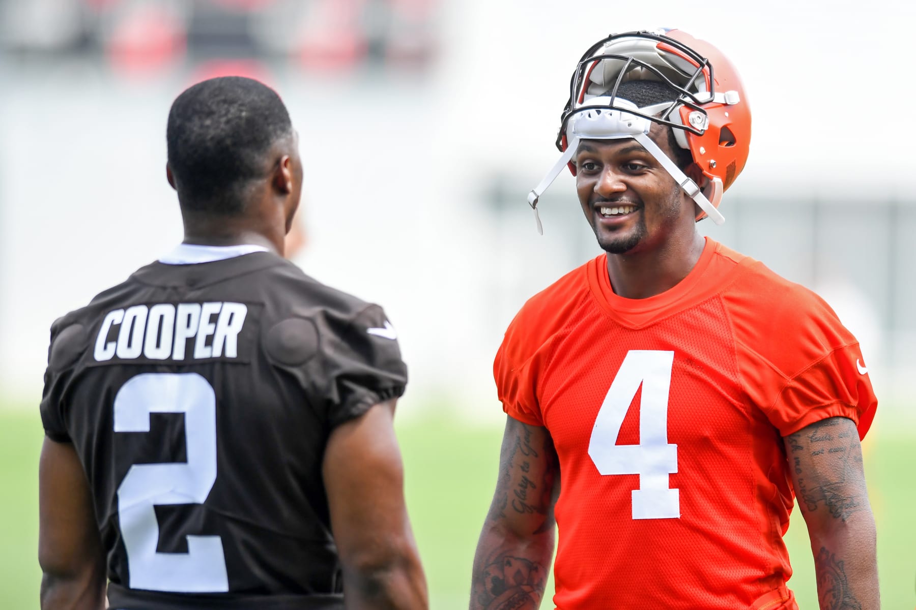 BEREA, OH - JUNE 01: Deshaun Watson #4 of the Cleveland Browns talks with Amari Cooper #2 during the Cleveland Browns offseason workout at CrossCountry Mortgage Campus on June 1, 2022 in Berea, Ohio. (Photo by Nick Cammett/Getty Images)
