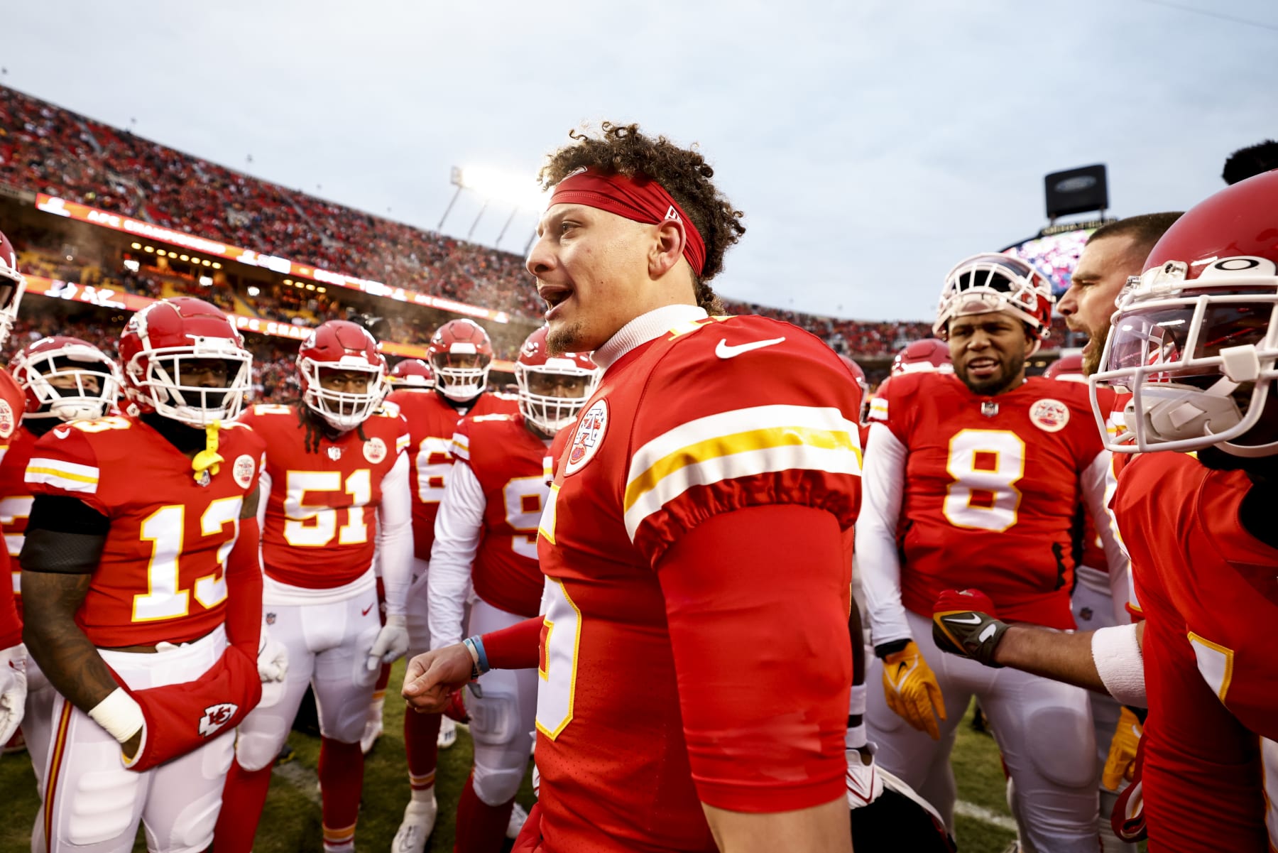 KANSAS CITY, MISSOURI - JANUARY 29: Patrick Mahomes #15 of the Kansas City Chiefs leads a huddle prior to the AFC Championship NFL football game between the Kansas City Chiefs and the Cincinnati Bengals at GEHA Field at Arrowhead Stadium on January 29, 2023 in Kansas City, Missouri. (Photo by Michael Owens/Getty Images)