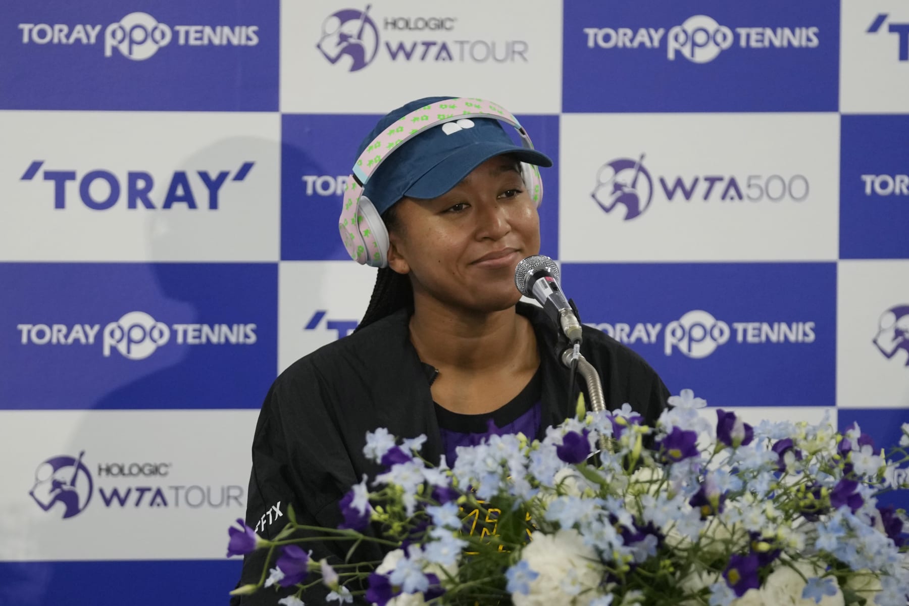 Naomi Osaka of Japan listens to a question during a news conference at the Pan Pacific Open tennis tournament in Tokyo, Monday, Sept. 19, 2022. (AP Photo/Hiro Komae) Naomi Osaka of Japan listens to a question during a news conference at the Pan Pacific Open tennis tournament in Tokyo, Monday, Sept. 19, 2022. (AP Photo/Hiro Komae)