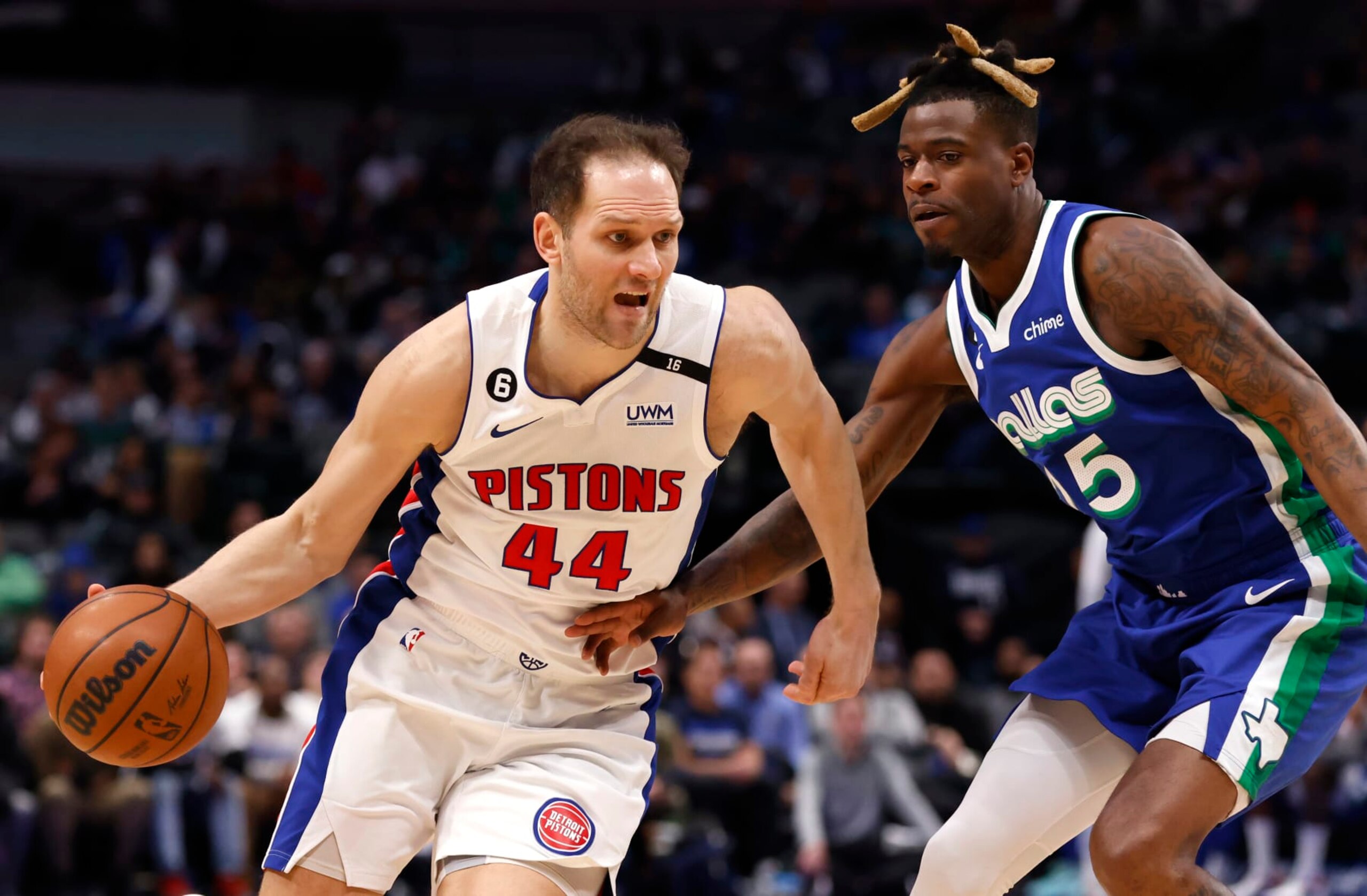 DALLAS, TX - JANUARY 30: Bojan Bogdanovic #44 of the Detroit Pistons drives against Reggie Bullock #25 of the Dallas Mavericks in the second half at American Airlines Center on January 30, 2023 in Dallas, Texas. The Mavericks won 111-105. NOTE TO USER: User expressly acknowledges and agrees that, by downloading and or using this photograph, User is consenting to the terms and conditions of the Getty Images License Agreement. (Photo by Ron Jenkins/Getty Images)