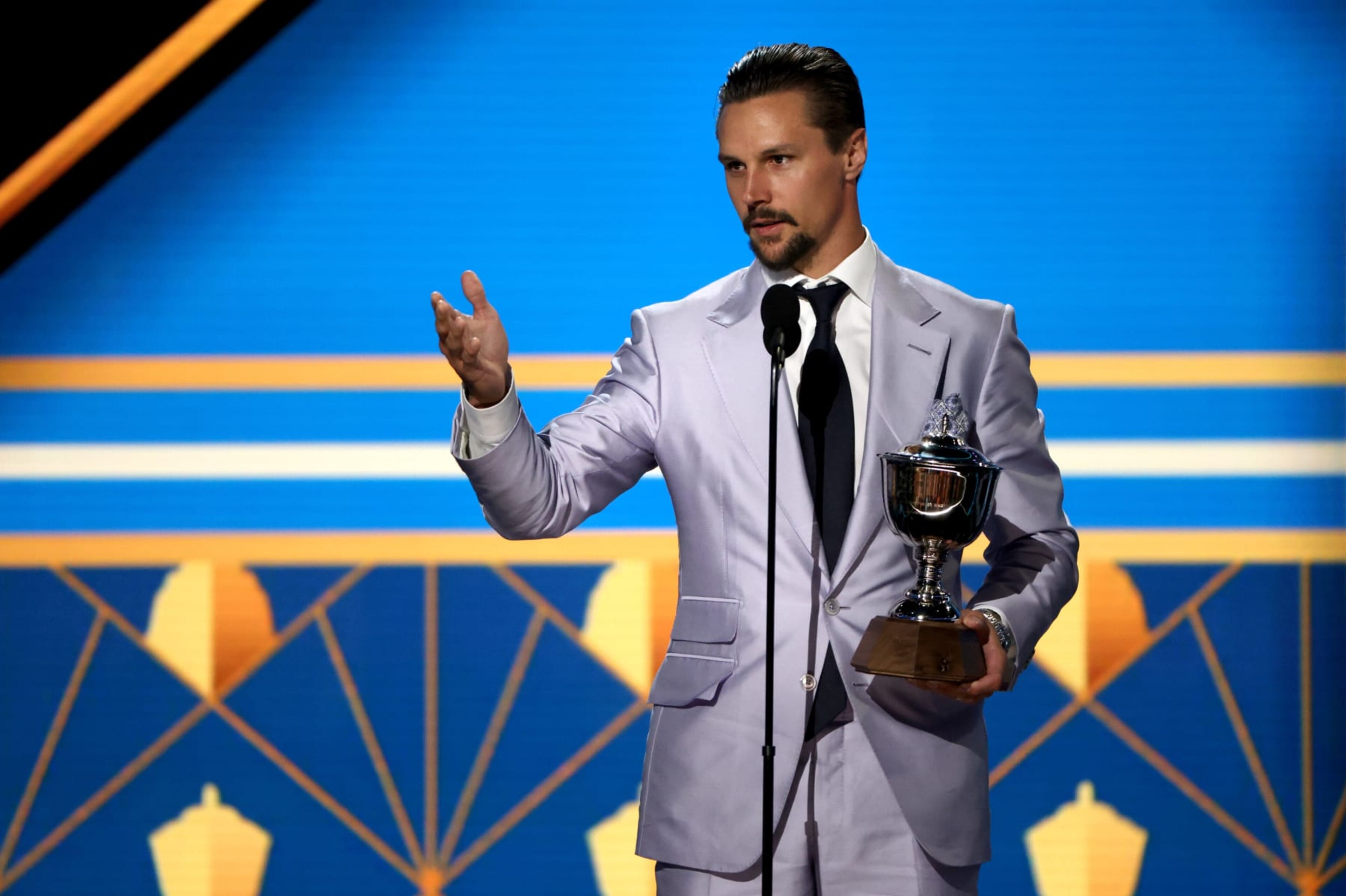 NASHVILLE, TENNESSEE - JUNE 26: Erik Karlsson of the San Jose Sharks speaks onstage after being awarded the James Norris Memorial Trophy at the 2023 NHL Awards at Bridgestone Arena on June 26, 2023 in Nashville, Tennessee. (Photo by Dave Sandford/NHLI via Getty Images) NASHVILLE, TENNESSEE - JUNE 26: Erik Karlsson of the San Jose Sharks speaks onstage after being awarded the James Norris Memorial Trophy at the 2023 NHL Awards at Bridgestone Arena on June 26, 2023 in Nashville, Tennessee. (Photo by Dave Sandford/NHLI via Getty Images)