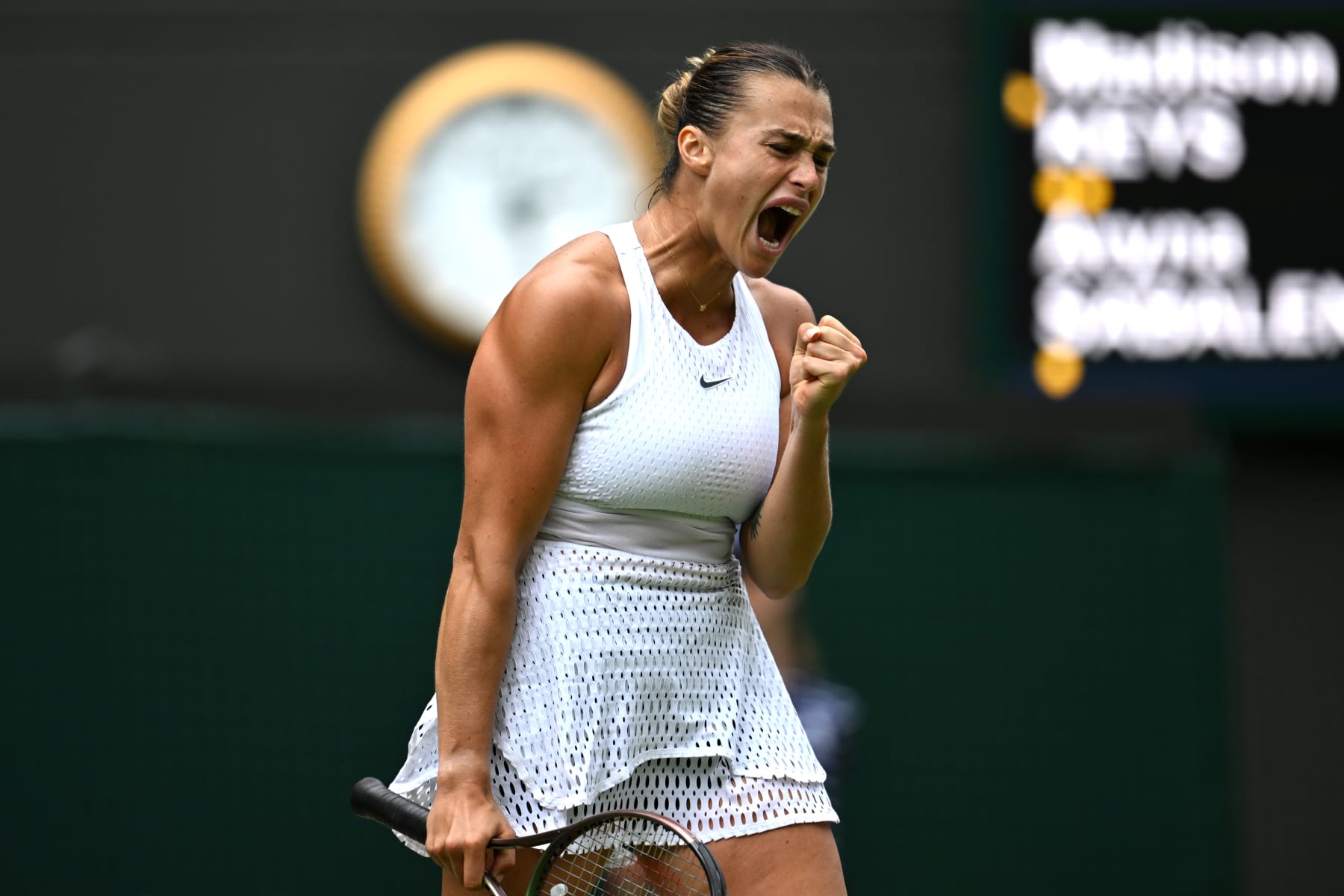 LONDON, ENGLAND - JULY 12: Aryna Sabalenka celebrates  against Madison Keys of United States in the Women's Singles Quarter Final match during day ten of The Championships Wimbledon 2023 at All England Lawn Tennis and Croquet Club on July 12, 2023 in London, England. (Photo by Shaun Botterill/Getty Images)