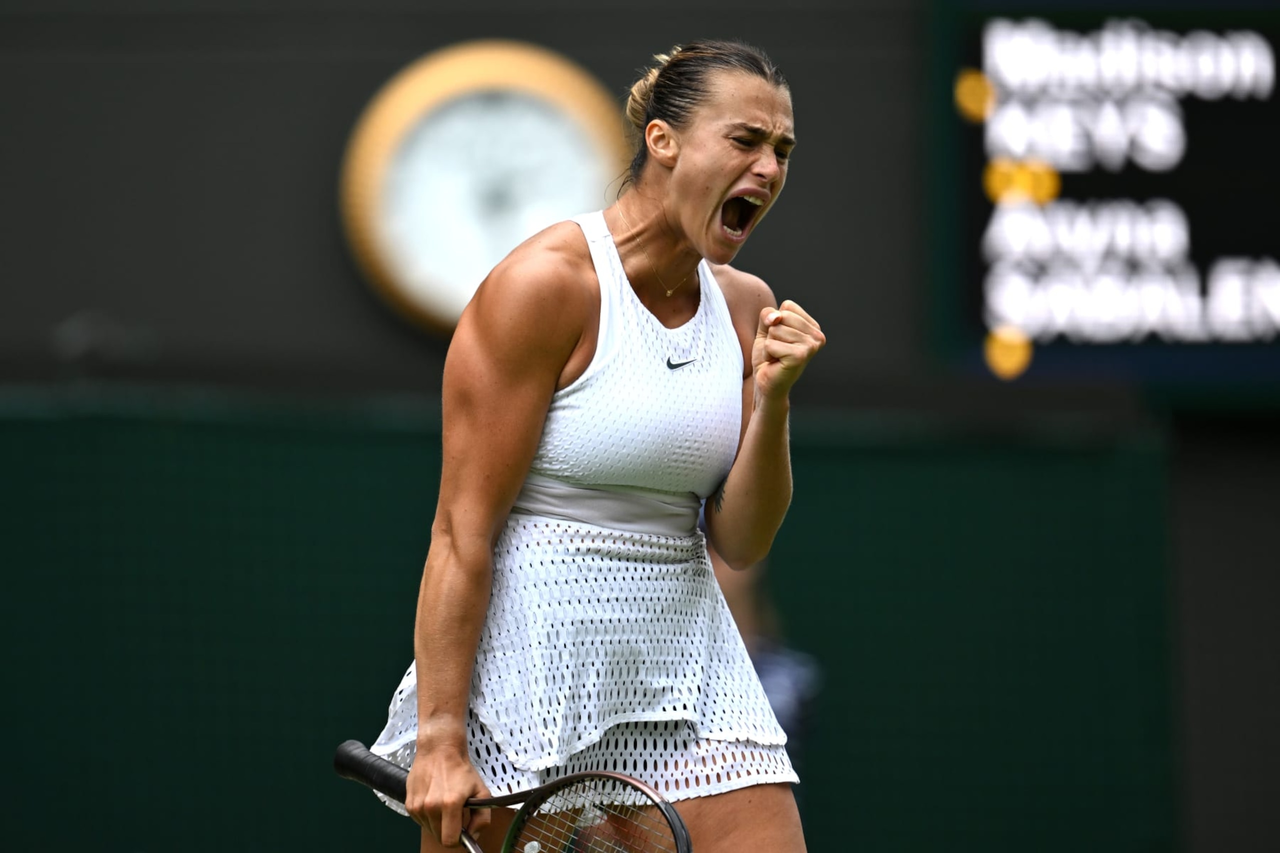 LONDON, ENGLAND - JULY 12: Aryna Sabalenka celebrates  against Madison Keys of United States in the Women's Singles Quarter Final match during day ten of The Championships Wimbledon 2023 at All England Lawn Tennis and Croquet Club on July 12, 2023 in London, England. (Photo by Shaun Botterill/Getty Images)