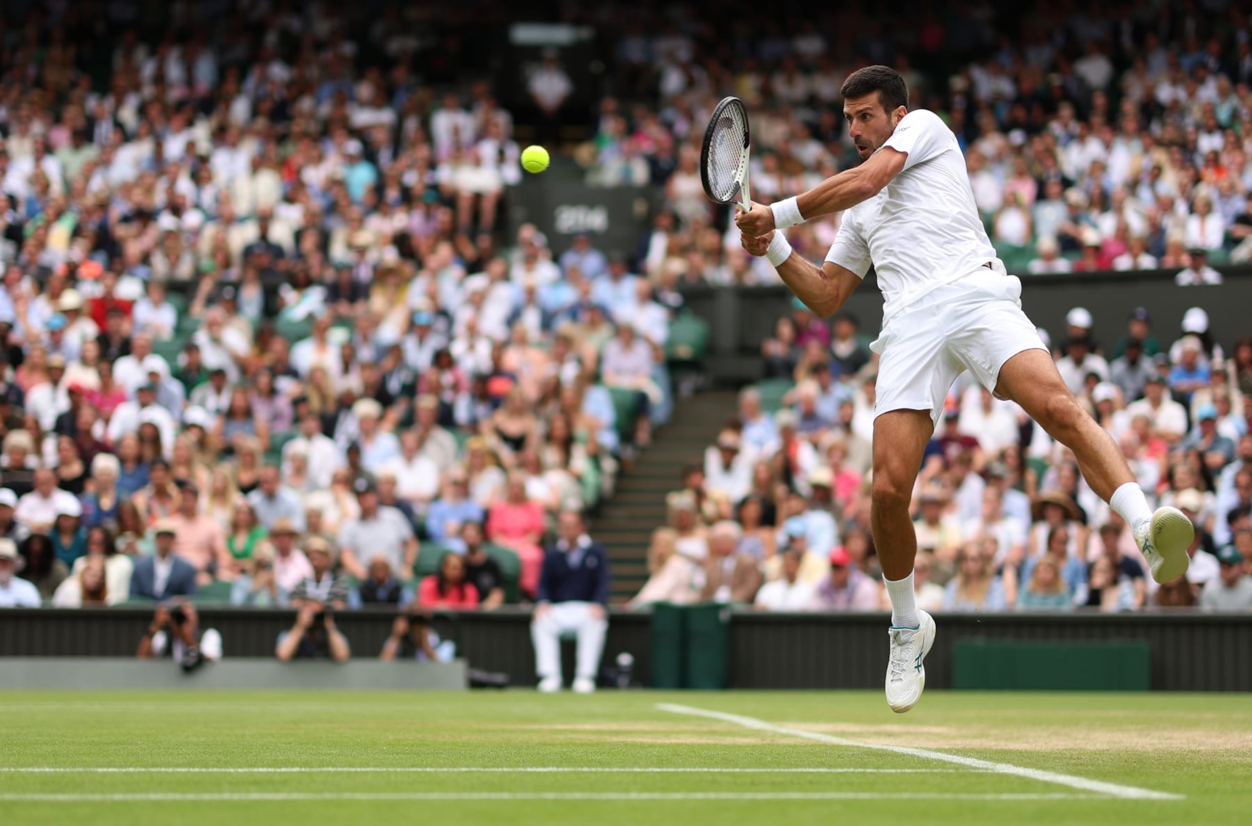 LONDON, ENGLAND - JULY 11: Novak Djokovic of Serbia in action against Andrey Rublev during the Men's Singles Quarter Final match during day nine of The Championships Wimbledon 2023 at All England Lawn Tennis and Croquet Club on July 11, 2023 in London, England. (Photo by Julian Finney/Getty Images)