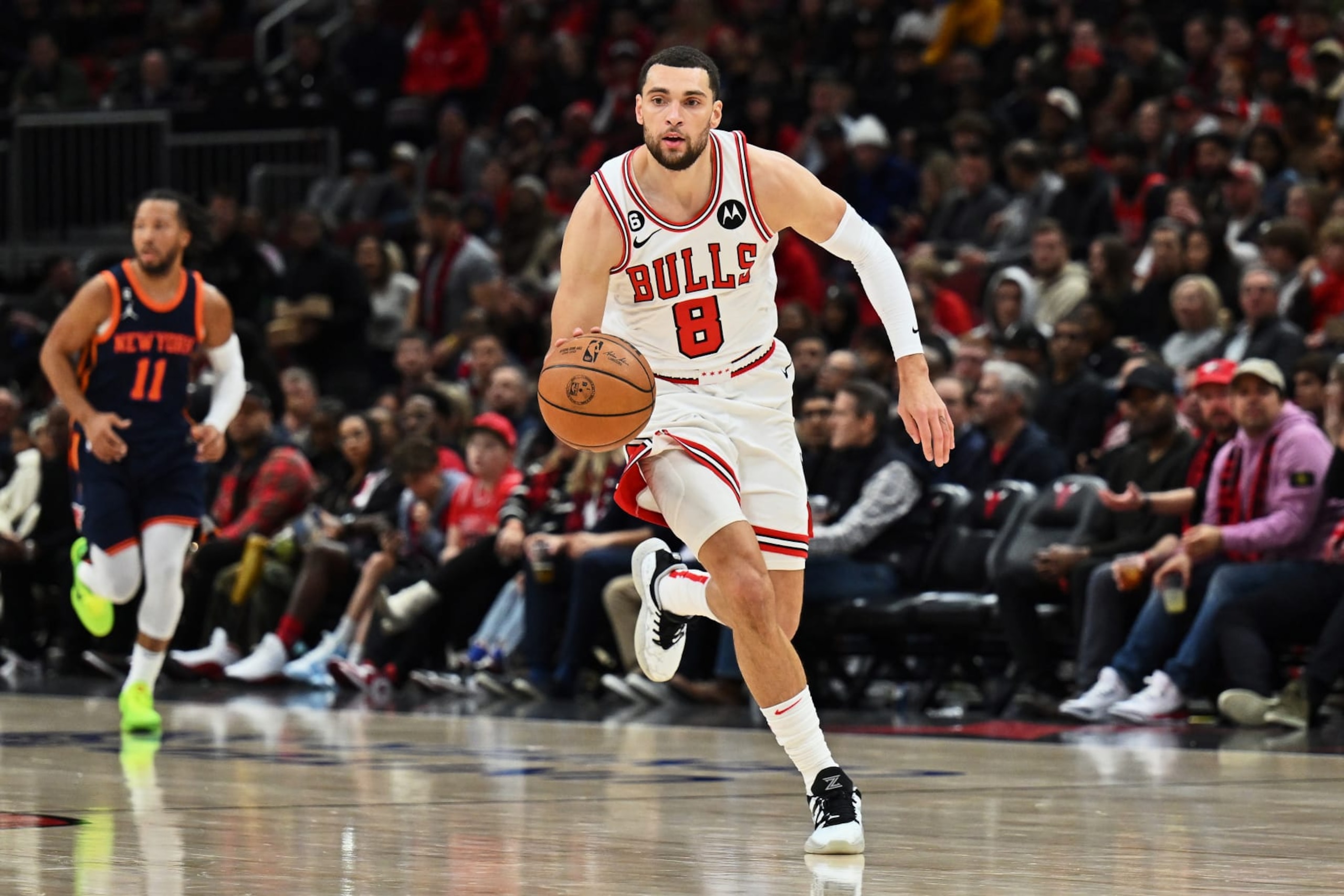 CHICAGO, ILLINOIS - DECEMBER 16:  Zach Lavine #8 of the Chicago Bulls controls the ball against the New York Knicks on December 16, 2022 at the United Center in Chicago, Illinois. New York defeated Chicago 114-91.  NOTE TO USER: User expressly acknowledges and agrees that, by downloading and or using this photograph, User is consenting to the terms and conditions of the Getty Images License Agreement.  (Photo by Jamie Sabau/Getty Images)