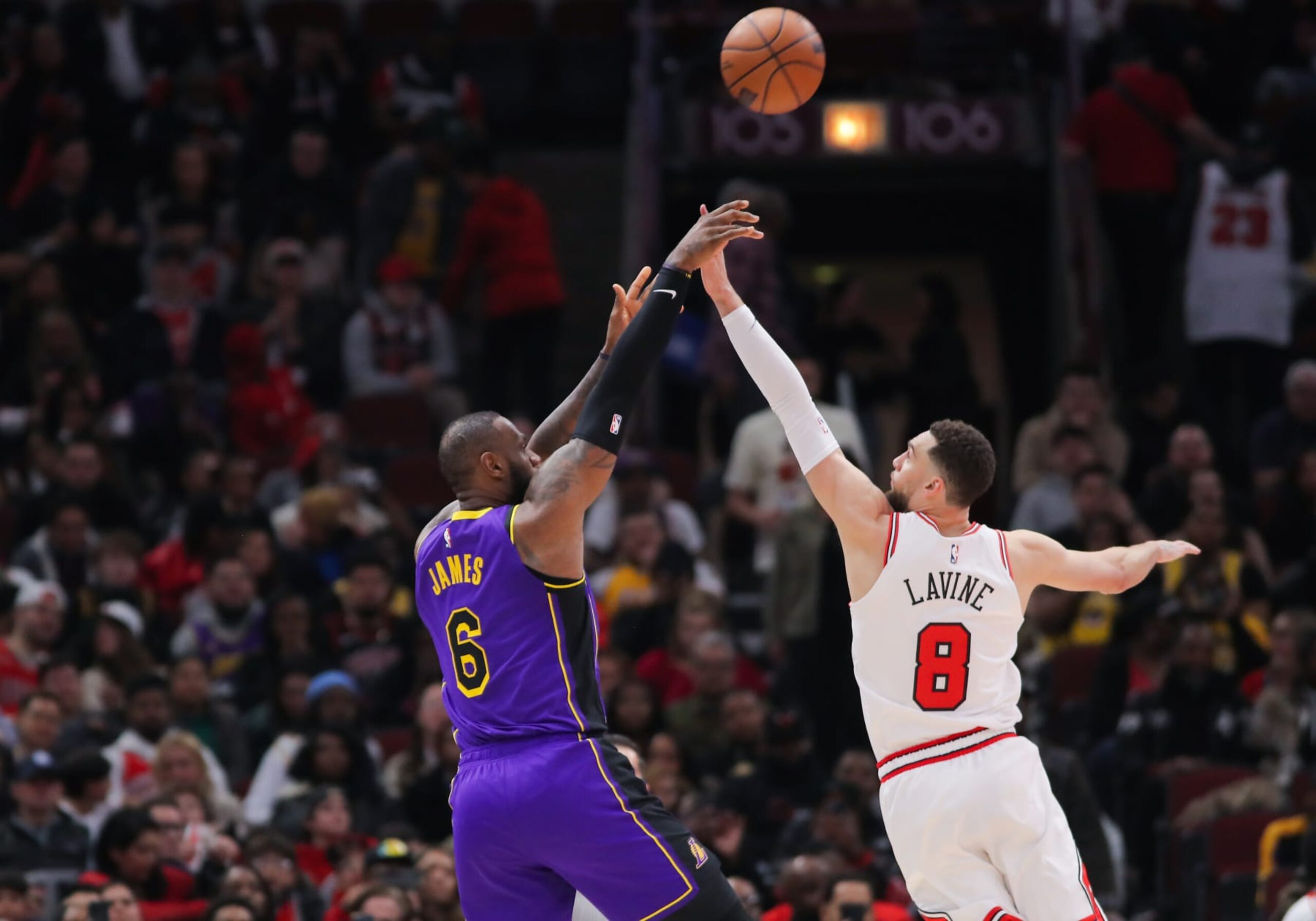 CHICAGO, IL - MARCH 29: Los Angeles Lakers forward LeBron James (6) shoots a 3-point basket over Chicago Bulls guard Zach LaVine (8) during a NBA game between the Los Angeles Lakers and the Chicago Bulls on March 29, 2023 at the United Center in Chicago, IL. (Photo by Melissa Tamez/Icon Sportswire via Getty Images)