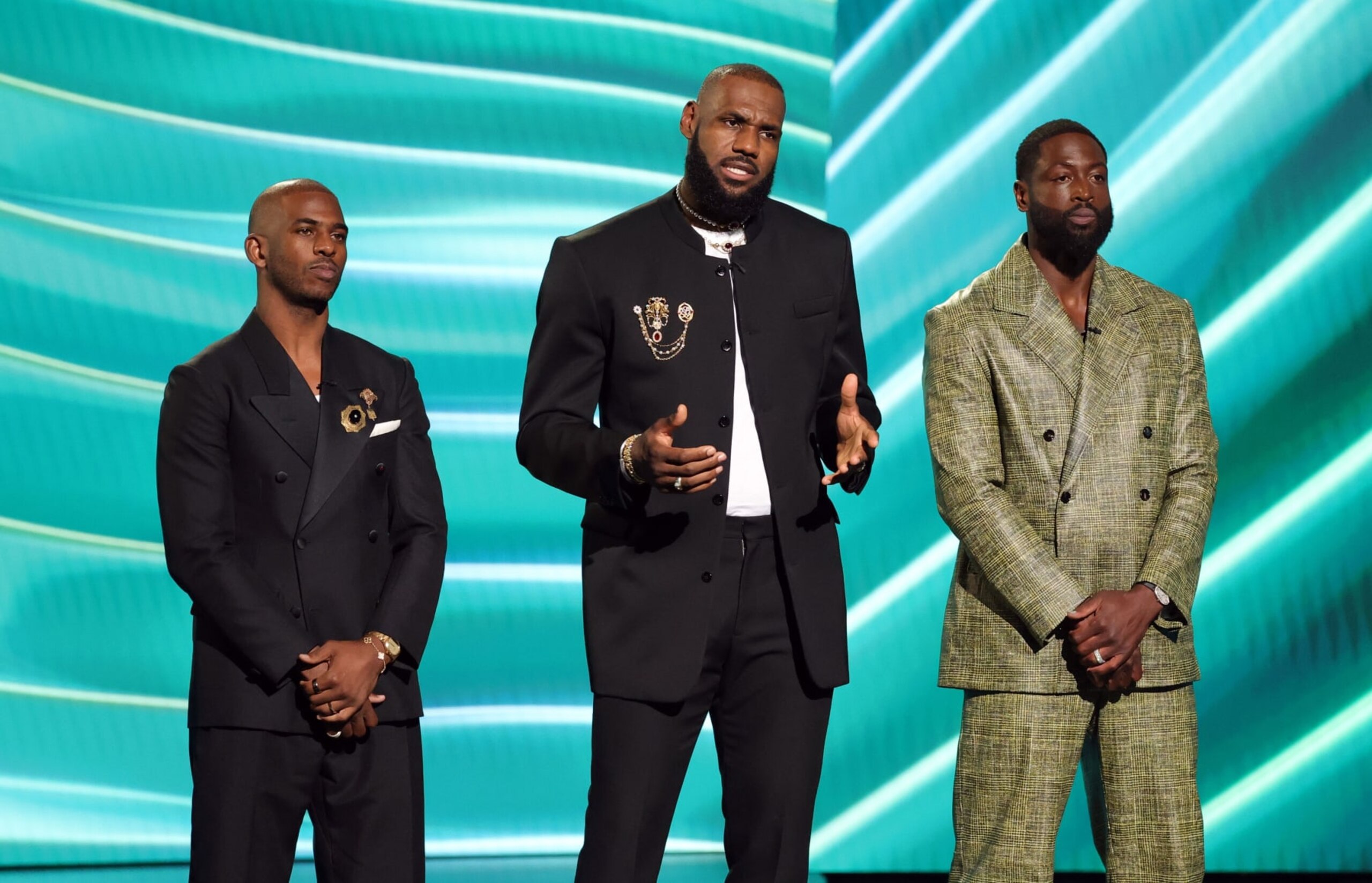 HOLLYWOOD, CALIFORNIA - JULY 12: (L-R) Chris Paul, LeBron James and Dwyane Wade speak onstage during The 2023 ESPY Awards at Dolby Theatre on July 12, 2023 in Hollywood, California. (Photo by Kevin Mazur/Getty Images)