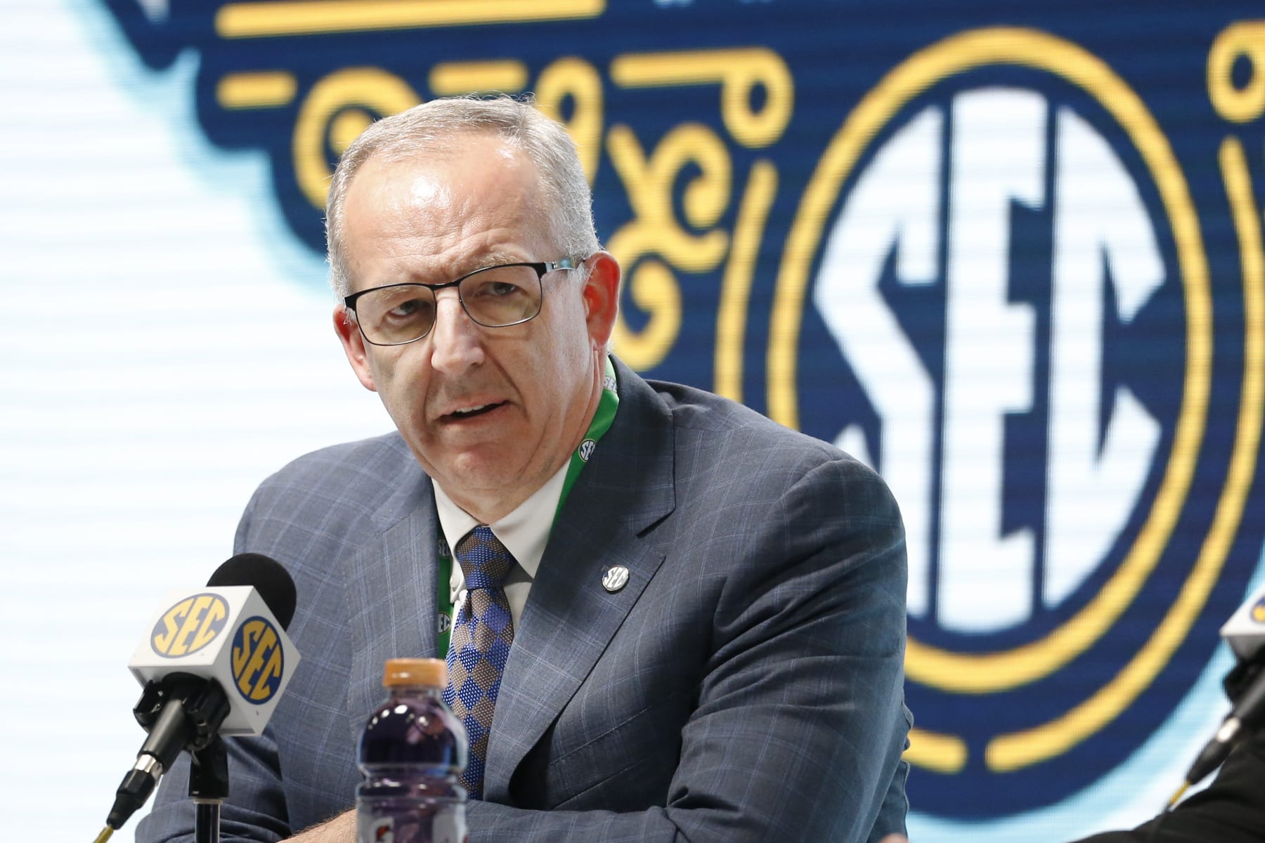 Southeastern Conference Commissioner Greg Sankey announces Wednesday, March 11, 2020, that fans will not be allowed in the arena to watch NCAA college basketball games in the SEC tournament in Nashville, Tenn., starting Thursday. The Southeastern Conference joined the rest of the Power Five leagues and announced that only family and essential personnel would attend its men's and women's tournament basketball games. (AP Photo/Mark Humphrey)