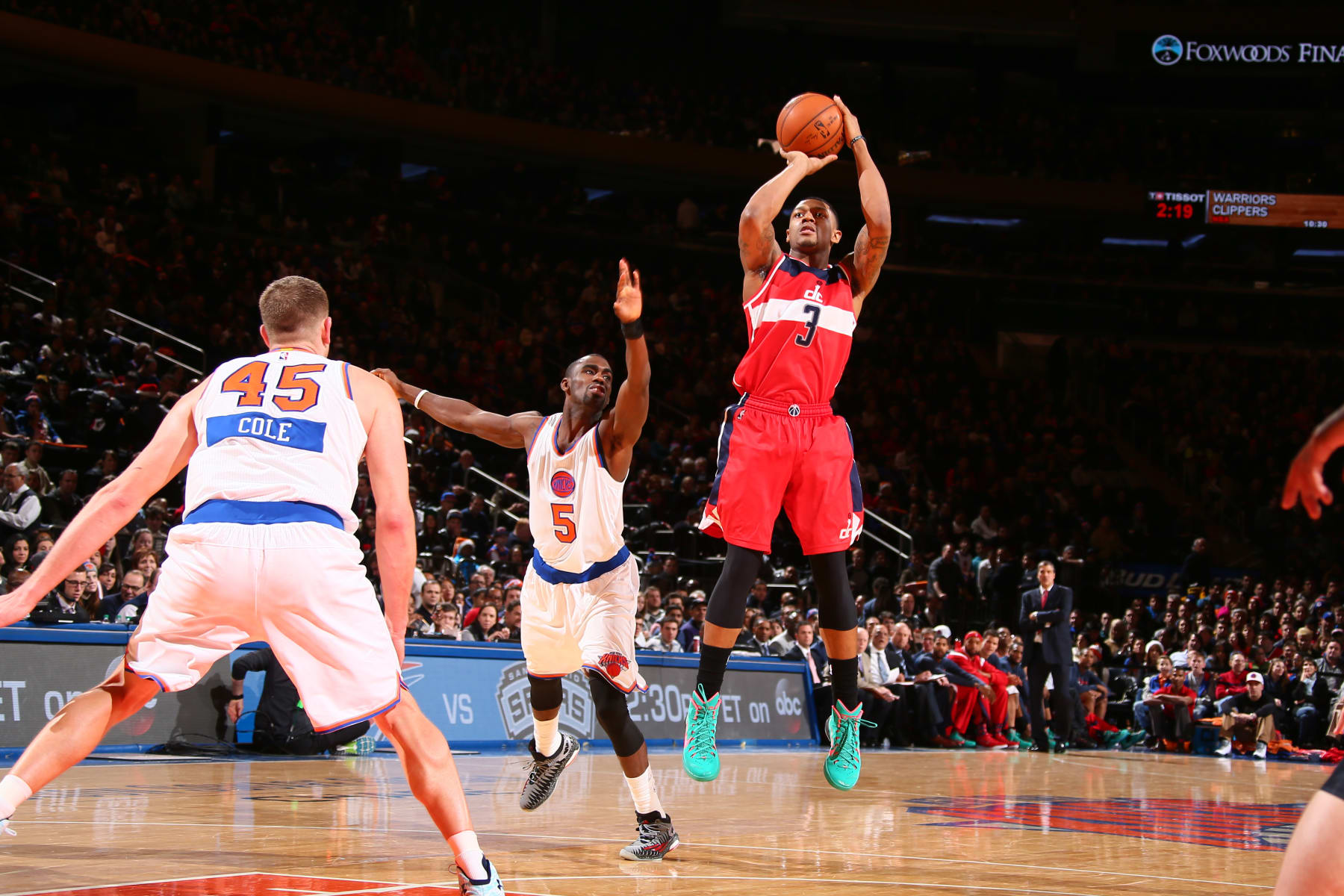 NEW YORK, NY - DECEMBER 25: Bradley Beal #3 of the Washington Wizards shoots against Tim Hardaway Jr. #5 of the New York Knicks at Madison Square Garden on December 25, 2014 in New York, New York. NOTE TO USER: User expressly acknowledges and agrees that, by downloading and/or using this Photograph, user is consenting to the terms and conditions of the Getty Images License Agreement. Mandatory Copyright Notice: Copyright 2014 NBAE (Photo by Nathaniel S. Butler/NBAE via Getty Images)