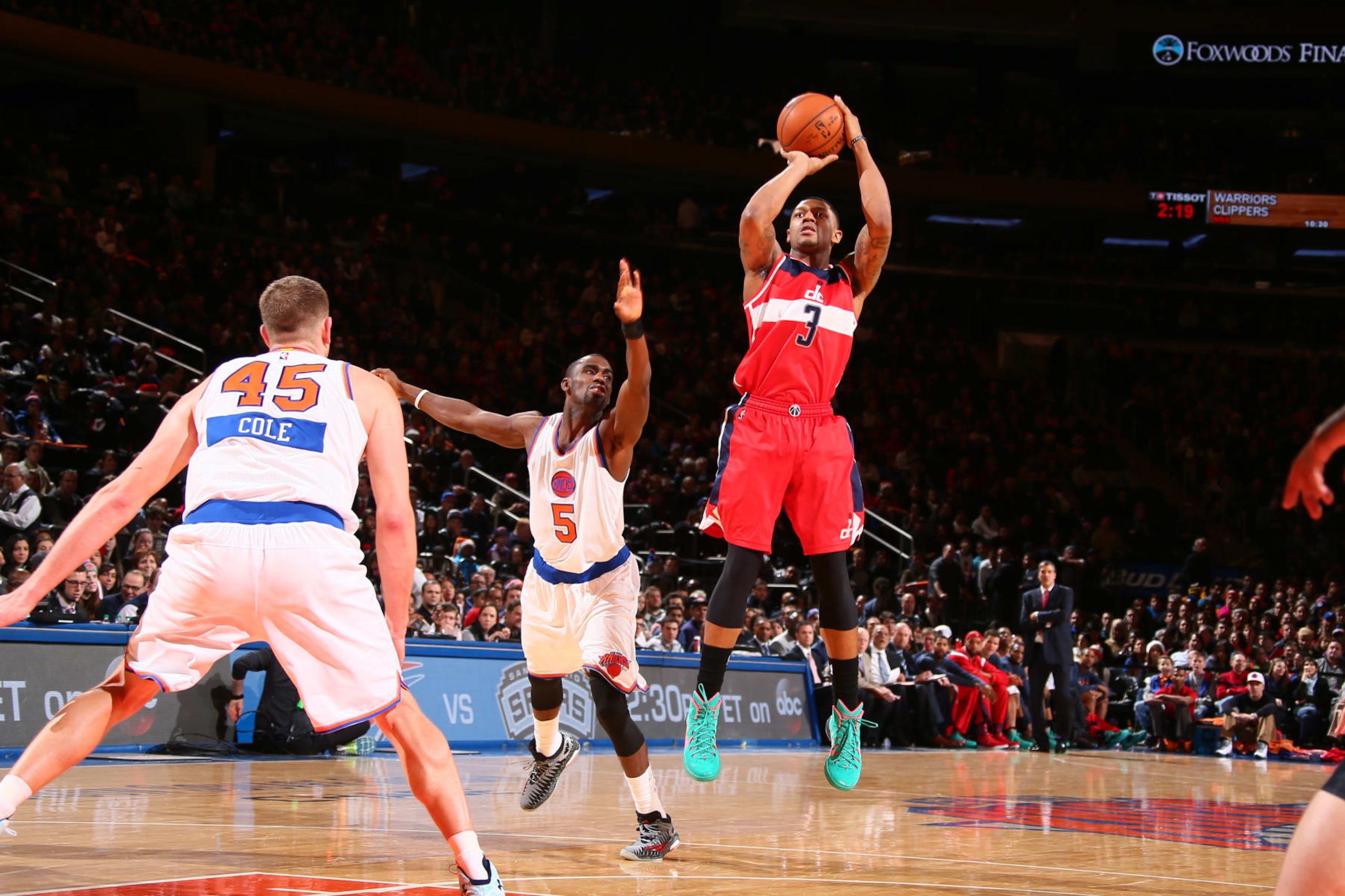NEW YORK, NY - DECEMBER 25: Bradley Beal #3 of the Washington Wizards shoots against Tim Hardaway Jr. #5 of the New York Knicks at Madison Square Garden on December 25, 2014 in New York, New York. NOTE TO USER: User expressly acknowledges and agrees that, by downloading and/or using this Photograph, user is consenting to the terms and conditions of the Getty Images License Agreement. Mandatory Copyright Notice: Copyright 2014 NBAE (Photo by Nathaniel S. Butler/NBAE via Getty Images)