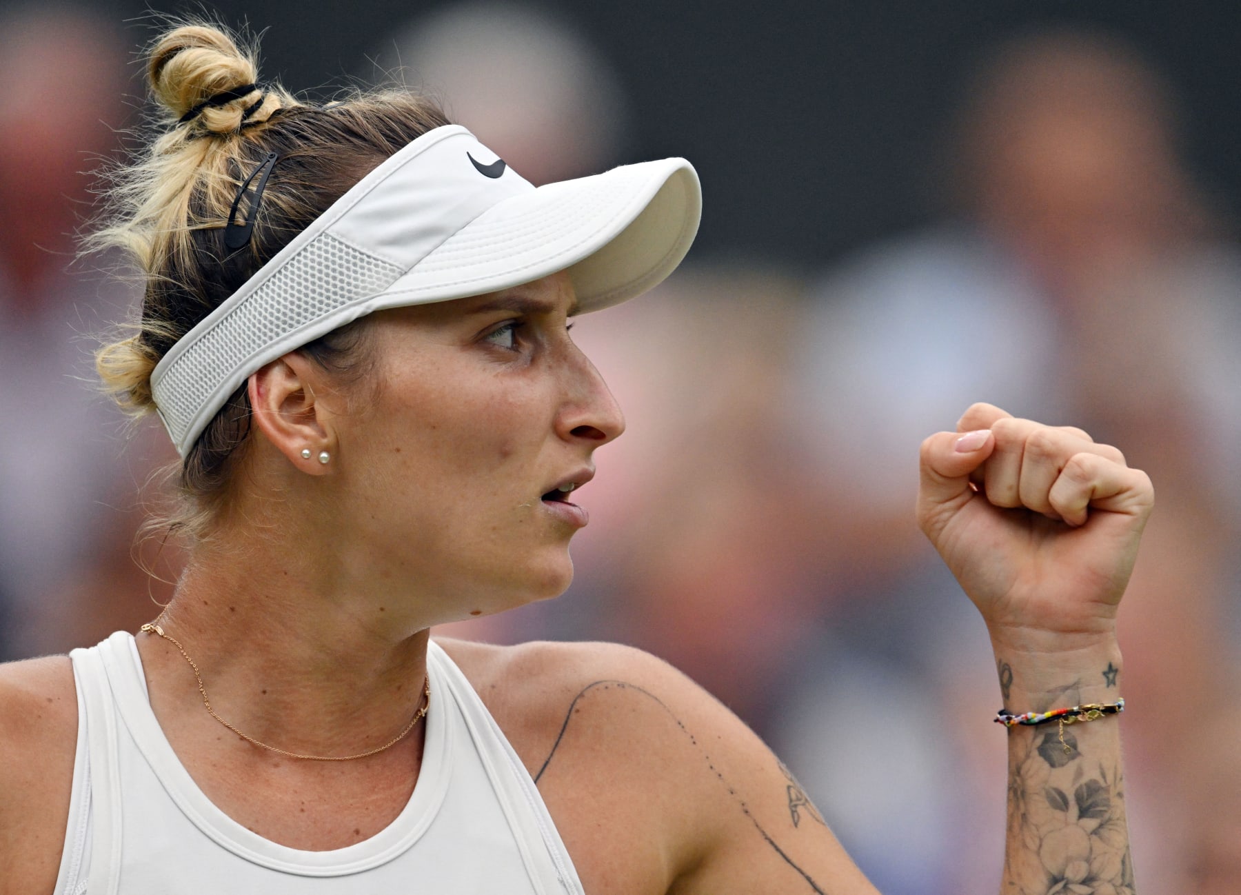 Czech Republic's Marketa Vondrousova reacts as she plays Ukraine's Elina Svitolina during their women's singles semi-finals tennis match on the eleventh day of the 2023 Wimbledon Championships at The All England Lawn Tennis Club in Wimbledon, southwest London, on July 13, 2023. (Photo by Glyn KIRK / AFP) / RESTRICTED TO EDITORIAL USE (Photo by GLYN KIRK/AFP via Getty Images)