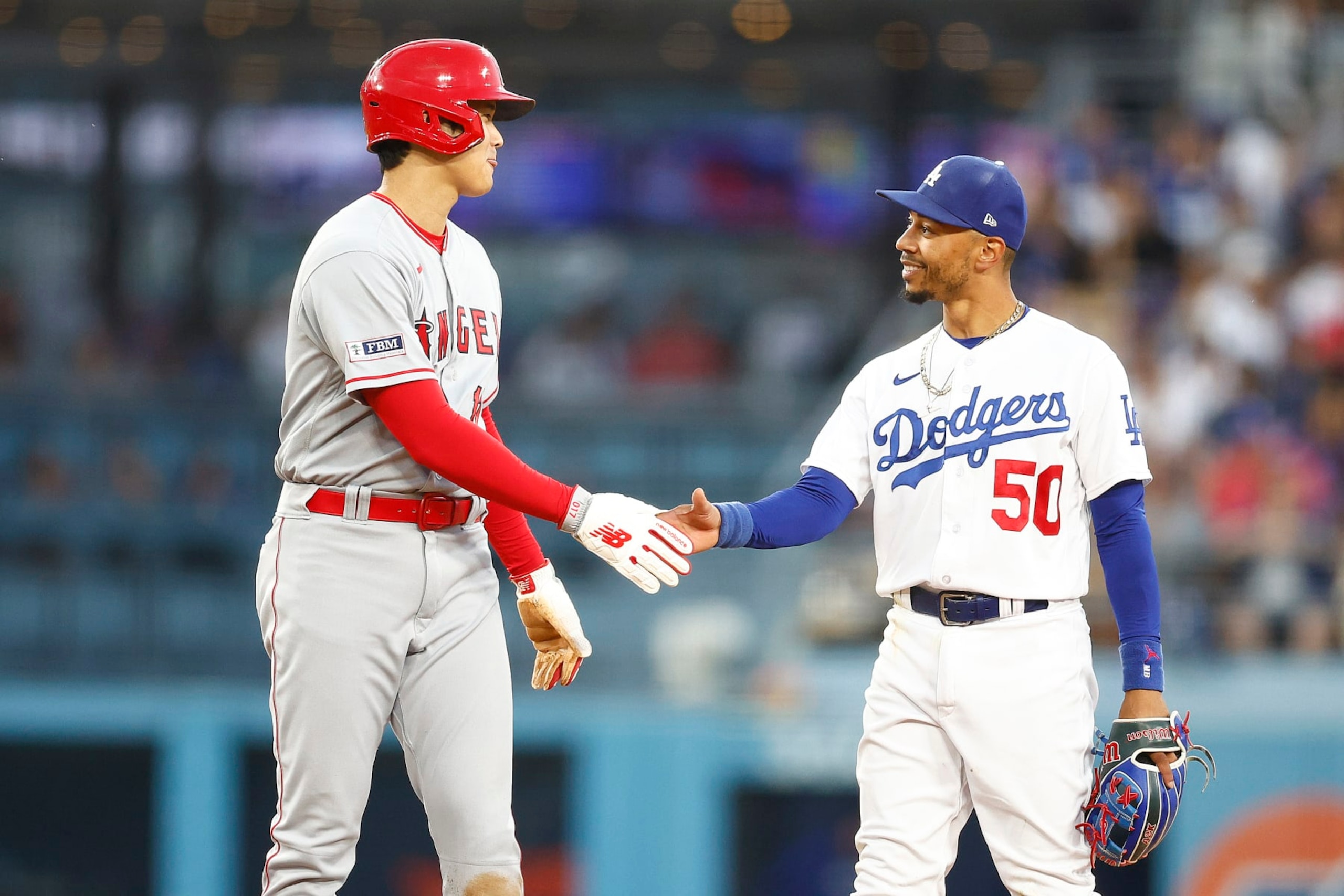 Shohei Ohtani (L) and Mookie Betts (R)