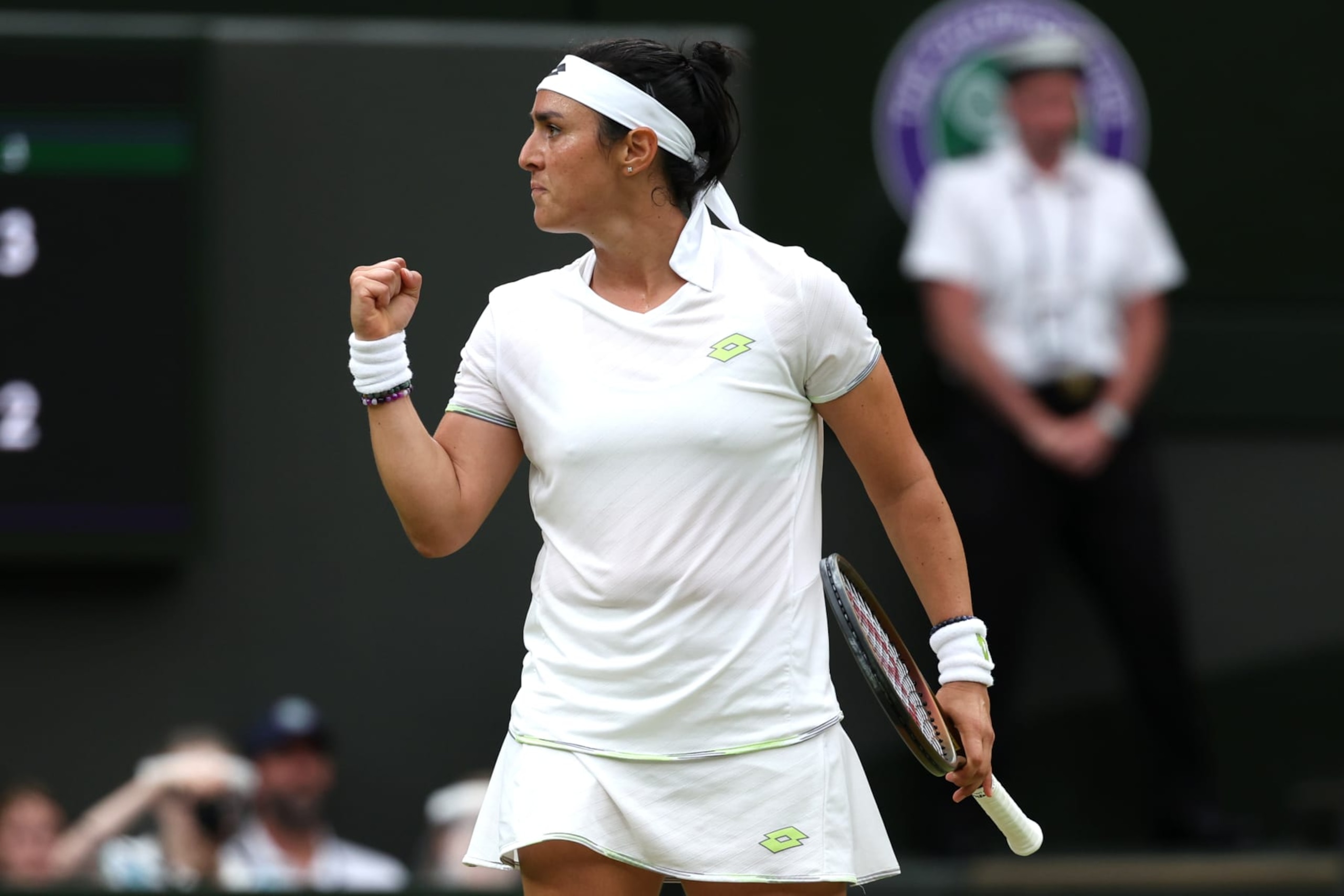 LONDON, ENGLAND - JULY 13: Ons Jabeur of Tunisia celebrates against Aryna Sabalenka in the Women's Singles Semi Finals on day eleven of The Championships Wimbledon 2023 at All England Lawn Tennis and Croquet Club on July 13, 2023 in London, England. (Photo by Patrick Smith/Getty Images)