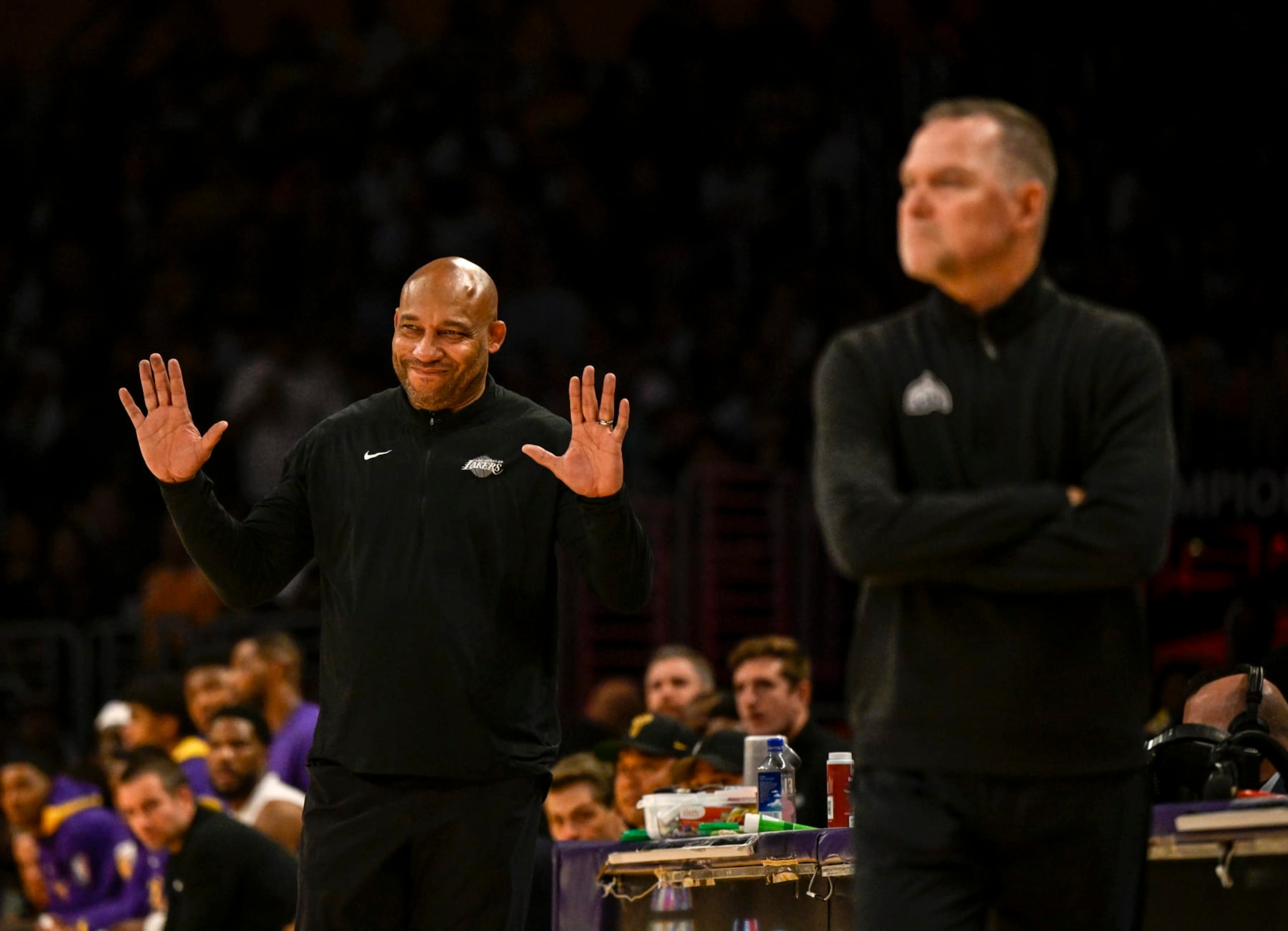 LOS ANGELES, CA - MAY 20: Los Angeles Lakers head coach Darvin Ham and Denver Nuggets head coach Michael Malone go head to head during the first quarter of the Western Conference finals game 3 at Crypto.com Arena in Los Angeles on Saturday, May 20, 2023. (Photo by AAron Ontiveroz/The Denver Post)