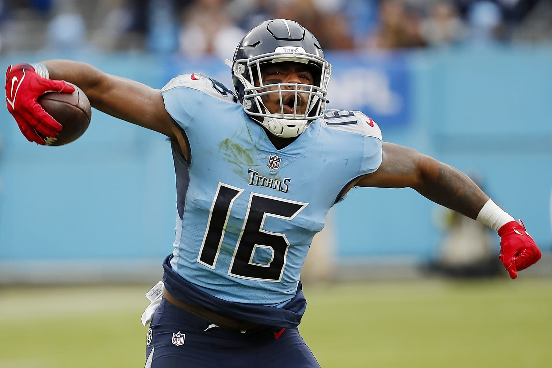 NASHVILLE, TENNESSEE - NOVEMBER 27: Treylon Burks #16 of the Tennessee Titans celebrates a catch for a first down during the third quarter at Nissan Stadium on November 27, 2022 in Nashville, Tennessee. (Photo by Silas Walker/Getty Images)