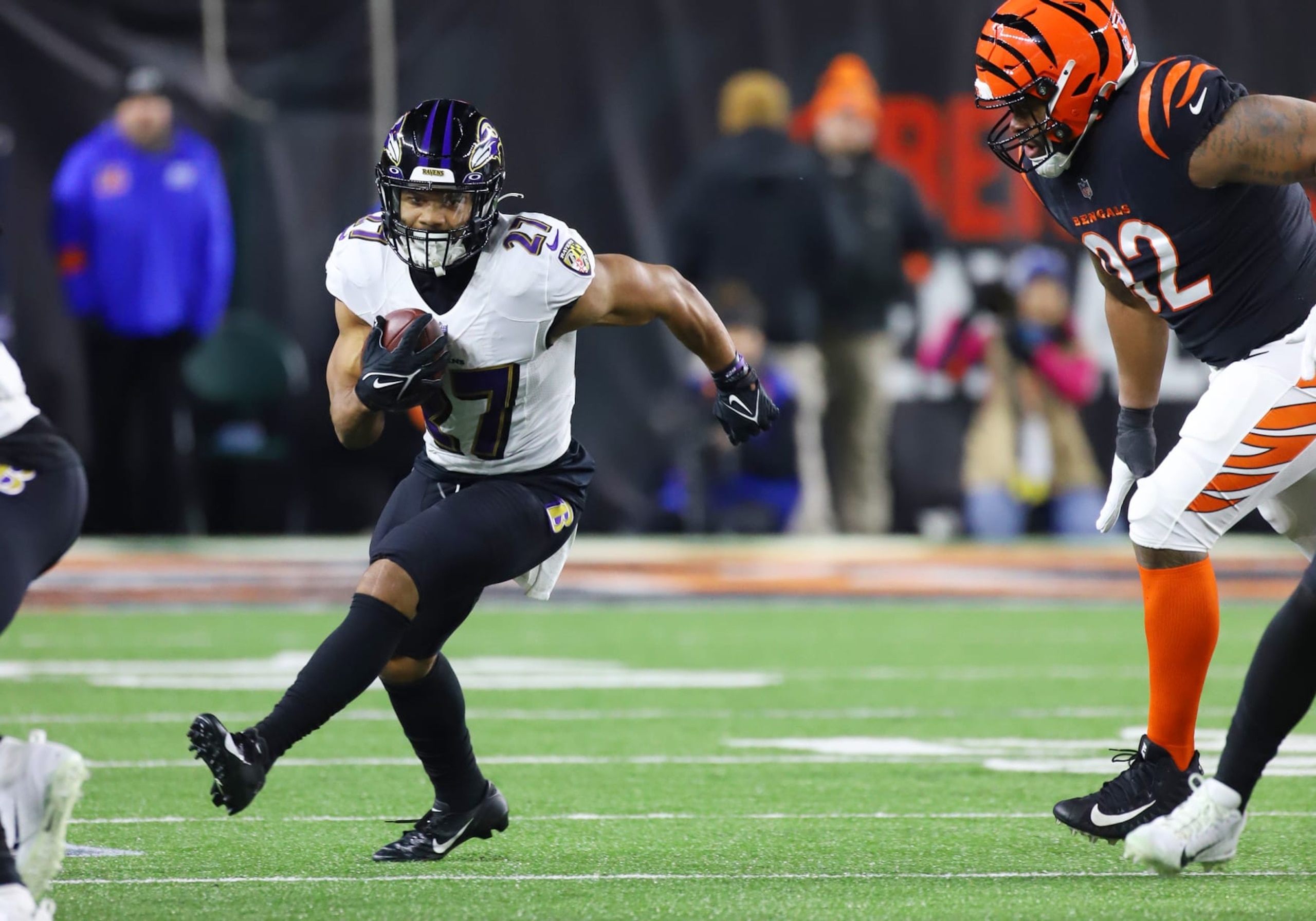 CINCINNATI, OH - JANUARY 15: Baltimore Ravens running back J.K. Dobbins (27) runs the ball in an AFC Wild Card Playoff game between the Baltimore Ravens and the Cincinnati Bengals on January 15, 2023, at Paycor Stadium in Cincinnati, OH. (Photo by Jeff Moreland/Icon Sportswire via Getty Images) CINCINNATI, OH - JANUARY 15: Baltimore Ravens running back J.K. Dobbins (27) runs the ball in an AFC Wild Card Playoff game between the Baltimore Ravens and the Cincinnati Bengals on January 15, 2023, at Paycor Stadium in Cincinnati, OH. (Photo by Jeff Moreland/Icon Sportswire via Getty Images)