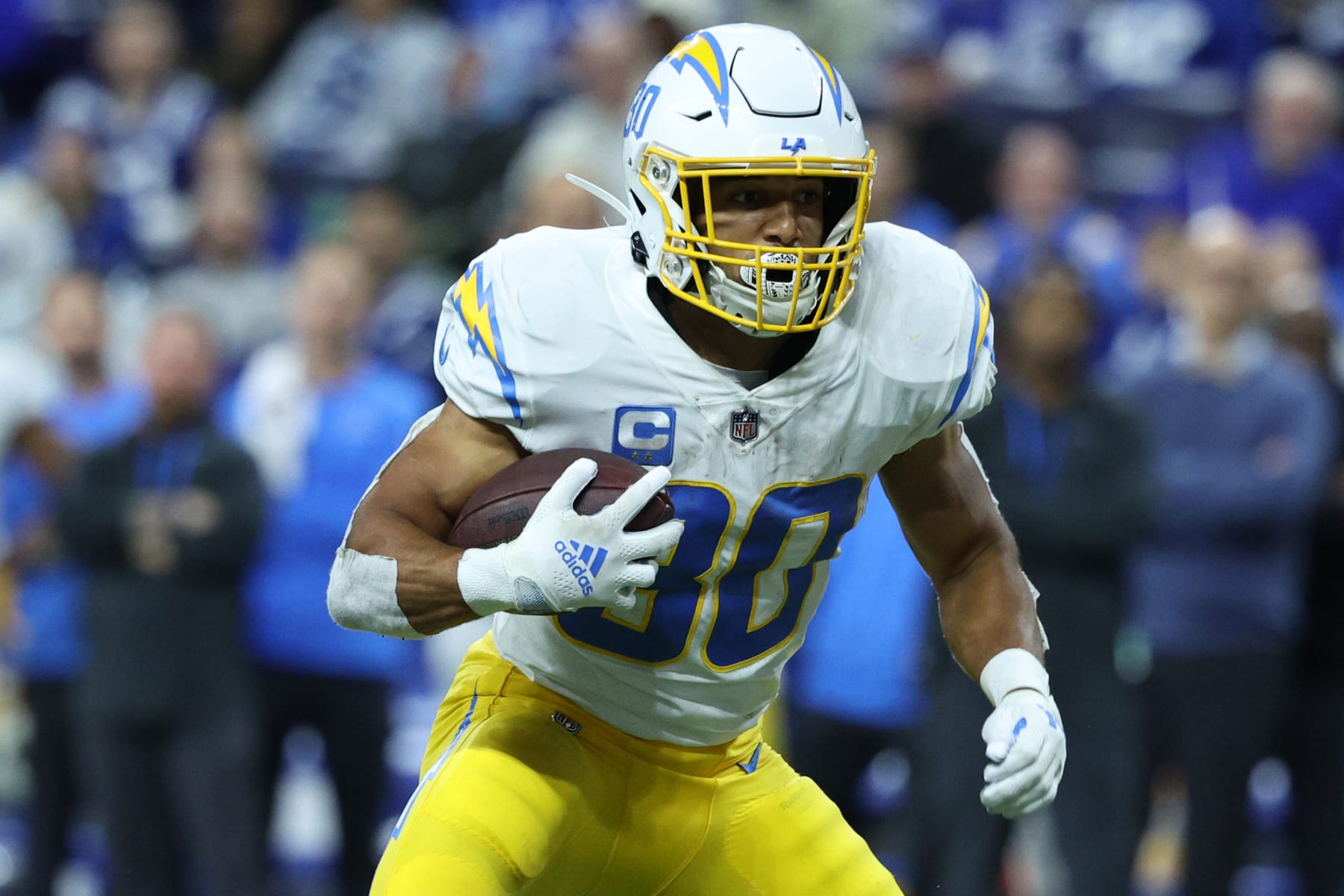 INDIANAPOLIS, INDIANA - DECEMBER 26: Austin Ekeler #30 of the Los Angeles Chargers runs with the ball against the Indianapolis Colts at Lucas Oil Stadium on December 26, 2022 in Indianapolis, Indiana. (Photo by Michael Hickey/Getty Images)