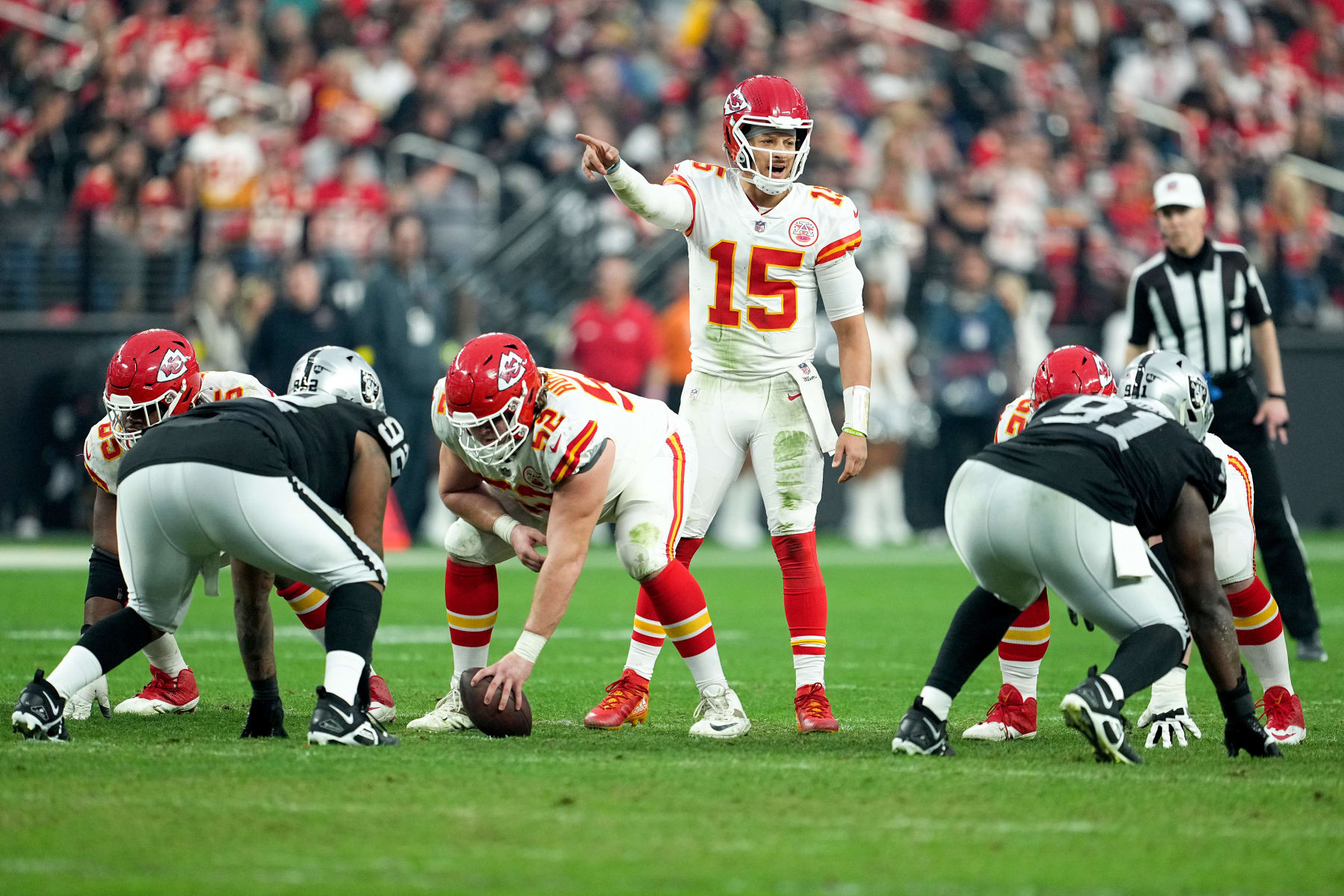 LAS VEGAS, NEVADA - JANUARY 07: Patrick Mahomes #15 of the Kansas City Chiefs signals at the line of scrimmage against the Las Vegas Raiders during the second half of the game at Allegiant Stadium on January 07, 2023 in Las Vegas, Nevada. (Photo by Jeff Bottari/Getty Images)