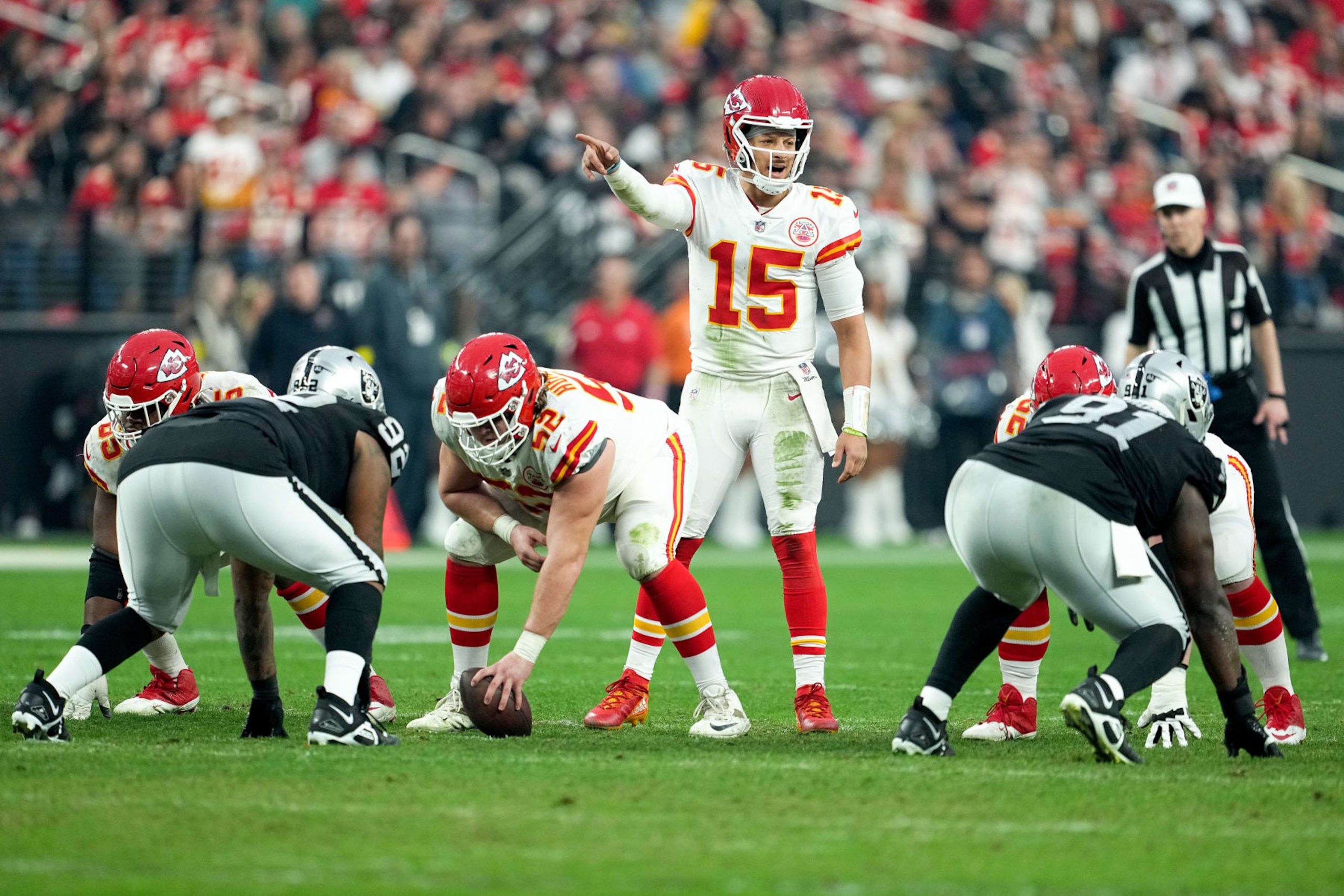 LAS VEGAS, NEVADA - JANUARY 07: Patrick Mahomes #15 of the Kansas City Chiefs signals at the line of scrimmage against the Las Vegas Raiders during the second half of the game at Allegiant Stadium on January 07, 2023 in Las Vegas, Nevada. (Photo by Jeff Bottari/Getty Images)