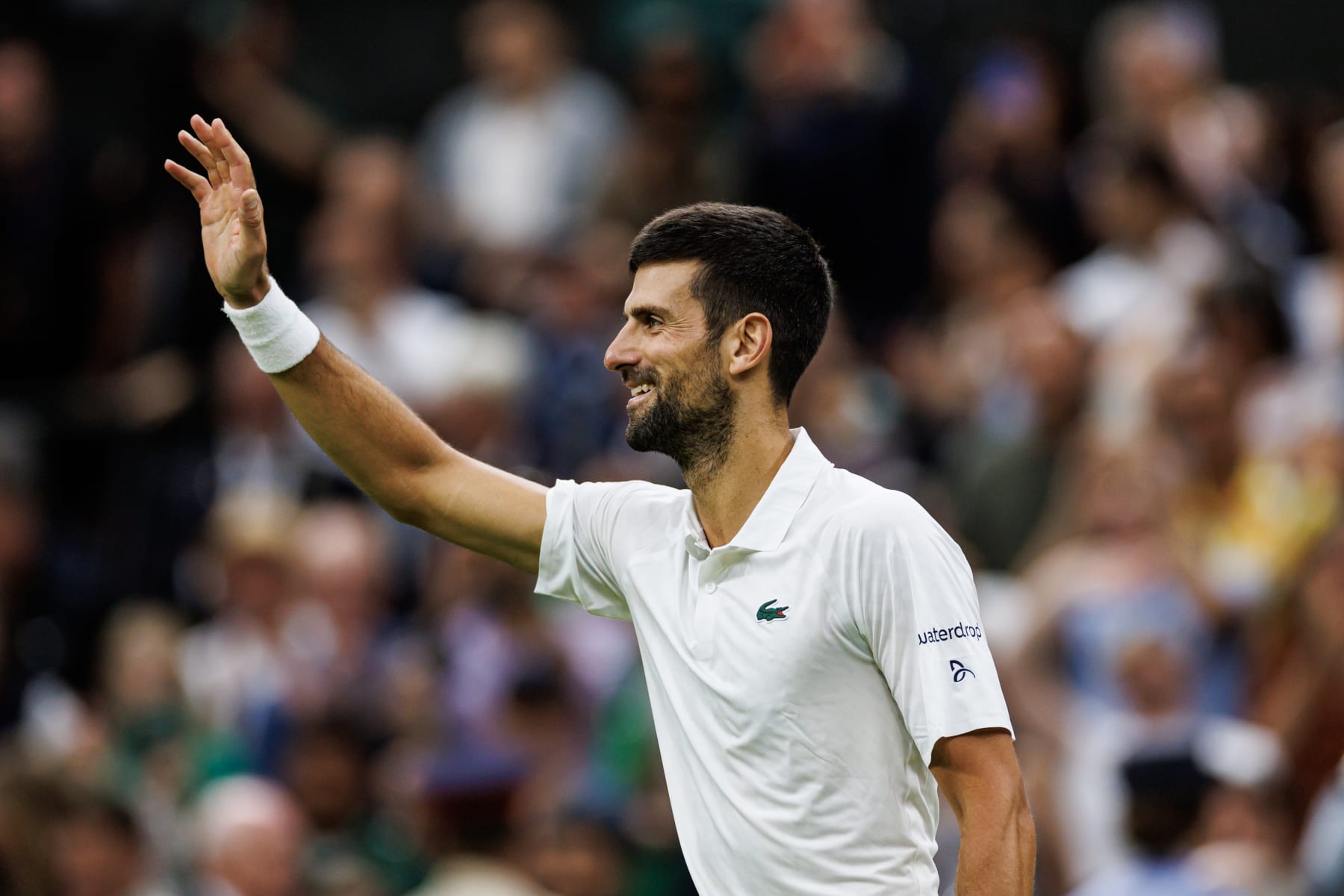 LONDON, ENGLAND - JULY 14: Novak Djokovic of Serbia celebrates his victory over Jannik Sinner of Italy in the Semi-Finals of the men's singles during day twelve of The Championships Wimbledon 2023 at All England Lawn Tennis and Croquet Club on July 14, 2023 in London, England. (Photo by Frey/TPN/Getty Images)