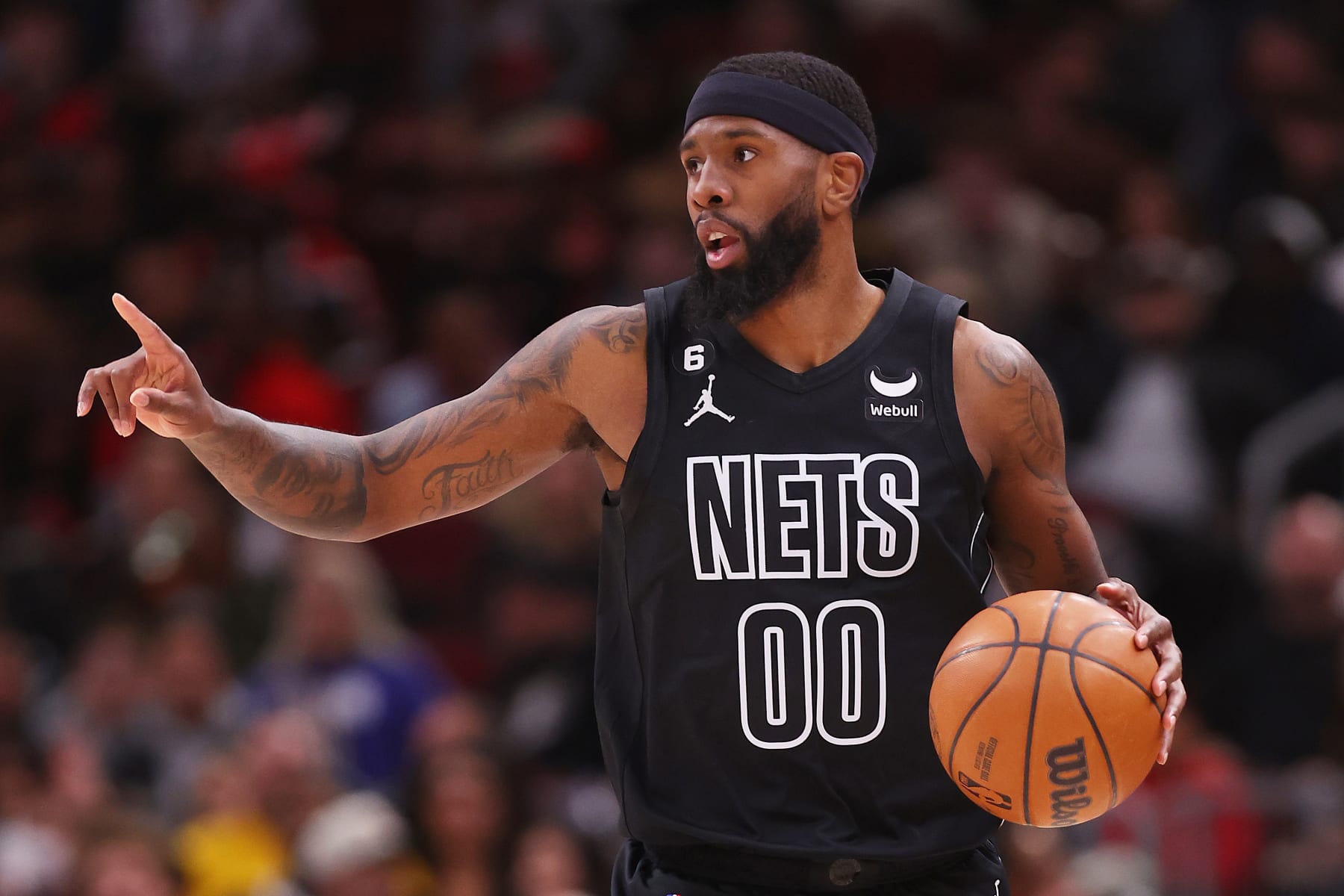 CHICAGO, ILLINOIS - FEBRUARY 24: Royce O'Neale #00 of the Brooklyn Nets dribbles against the Chicago Bulls during the first half at United Center on February 24, 2023 in Chicago, Illinois. NOTE TO USER: User expressly acknowledges and agrees that, by downloading and or using this photograph, User is consenting to the terms and conditions of the Getty Images License Agreement.  (Photo by Michael Reaves/Getty Images)