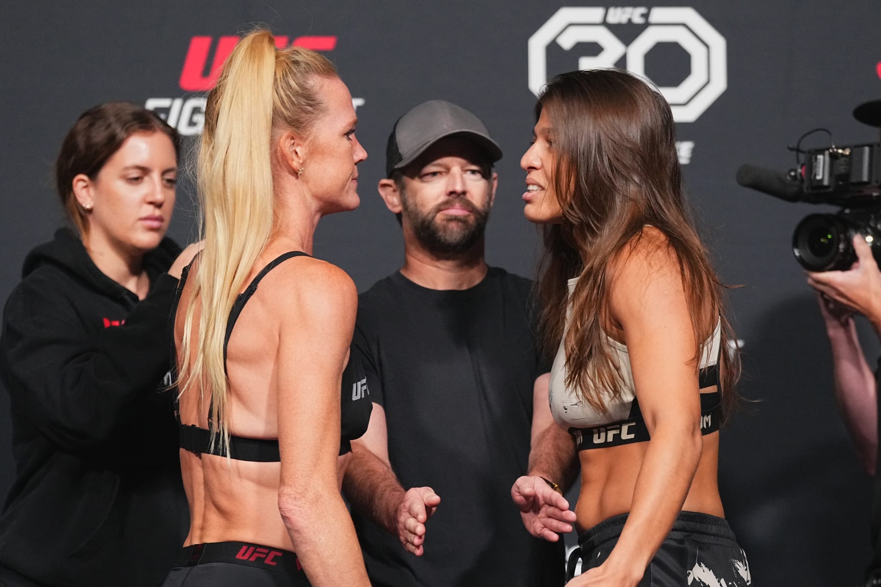 LAS VEGAS, NEVADA - JULY 14:  (L-R) Holly Holm and Mayra Bueno Silva of Brazil face off during the UFC Fight Night weigh-in at UFC APEX on July 14, 2023 in Las Vegas, Nevada. (Photo by Jeff Bottari/Zuffa LLC via Getty Images)