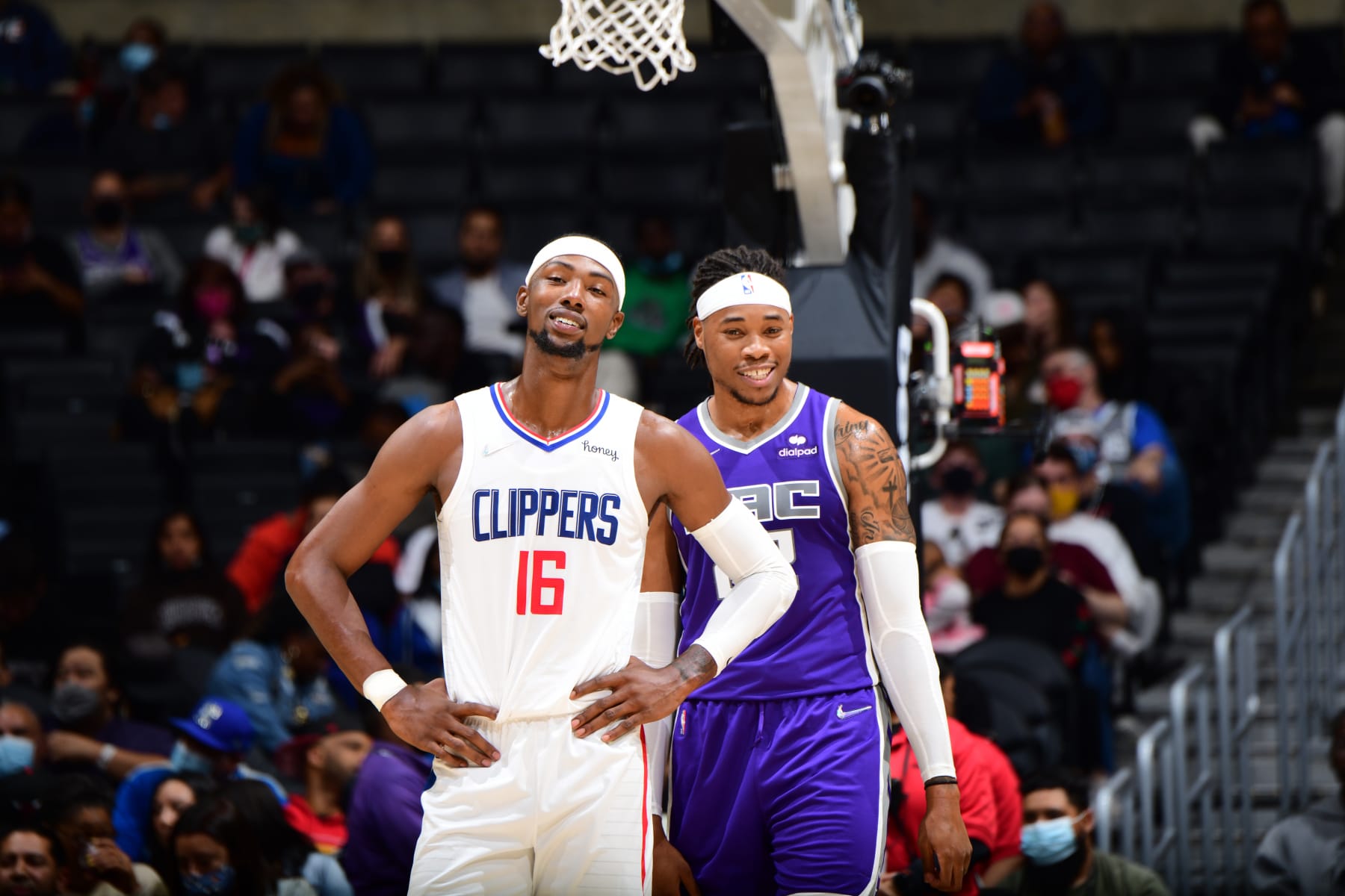 LOS ANGELES, CA - OCTOBER 6: Harry Giles III #16 of the LA Clippers and Richaun Holmes #22 of the Sacramento Kings smile during a preseason game on October 6, 2021 at STAPLES Center in Los Angeles, California. NOTE TO USER: User expressly acknowledges and agrees that, by downloading and/or using this Photograph, user is consenting to the terms and conditions of the Getty Images License Agreement. Mandatory Copyright Notice: Copyright 2021 NBAE (Photo by Adam Pantozzi/NBAE via Getty Images)
