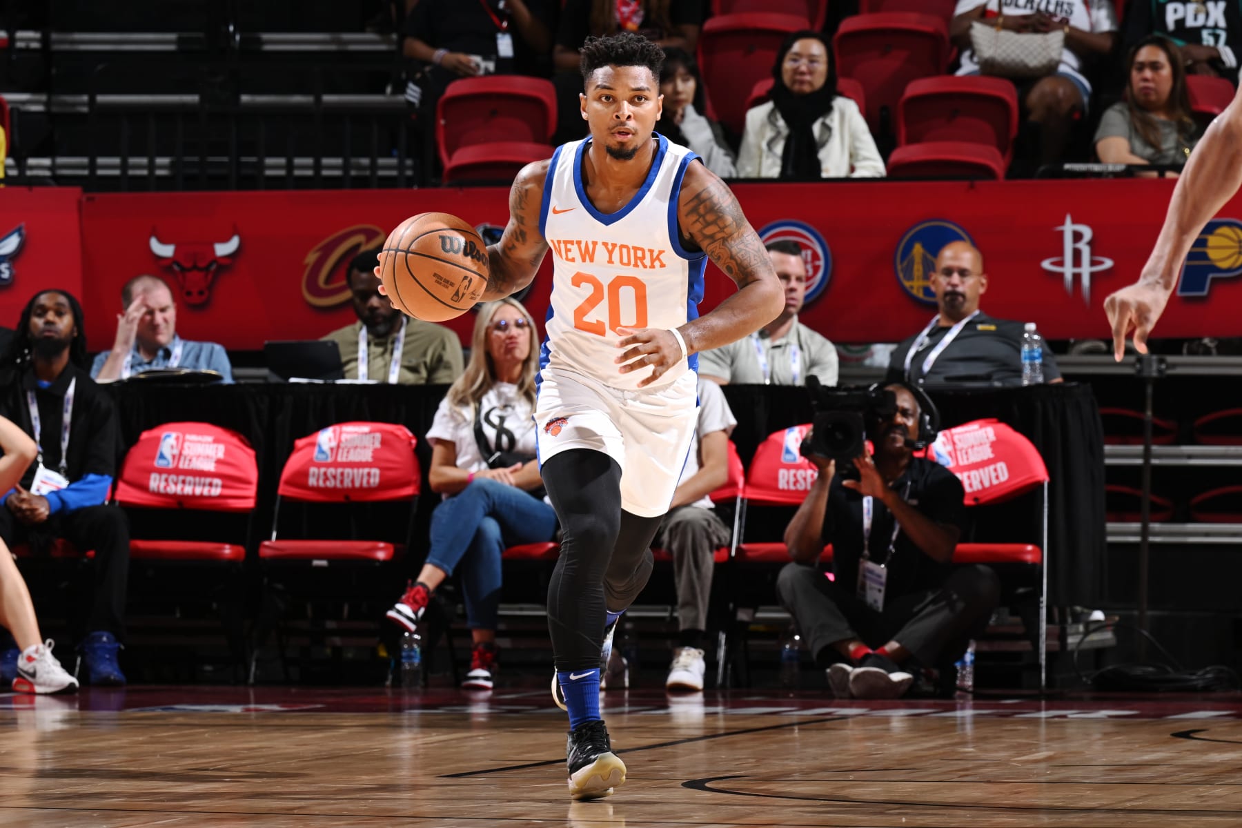LAS VEGAS, NV - JULY 15: QJ Peterson #20 of the New York Knicks dribbles the ball during the game against the Denver Nuggets during the 2023 NBA Summer League in Las Vegas on July 15, 2023 at the Thomas & Mack Center in Las Vegas, Nevada. NOTE TO USER: User expressly acknowledges and agrees that, by downloading and or using this photograph, User is consenting to the terms and conditions of the Getty Images License Agreement. Mandatory Copyright Notice: Copyright 2023 NBAE (Photo by David Dow/NBAE via Getty Images)