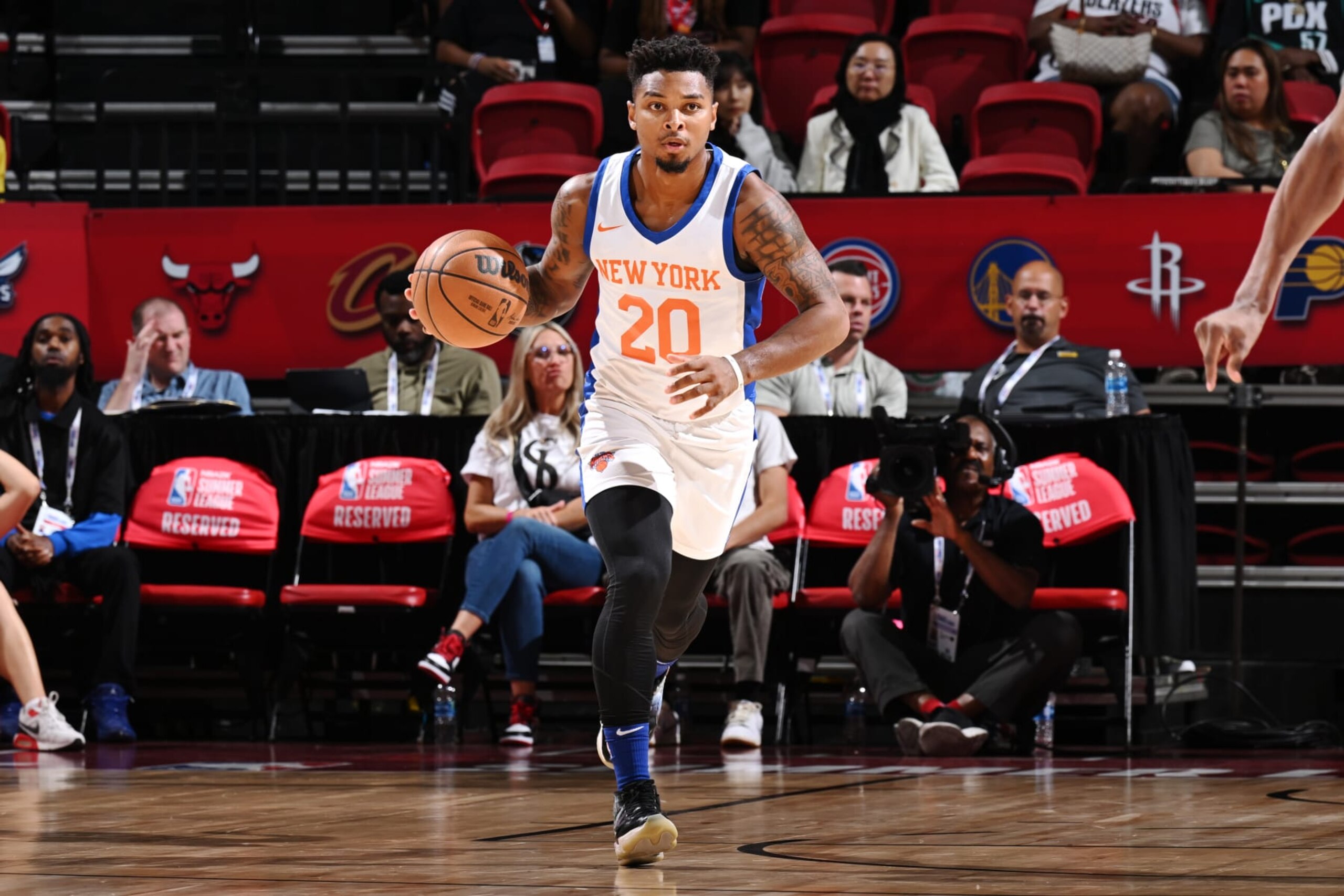 LAS VEGAS, NV - JULY 15: QJ Peterson #20 of the New York Knicks dribbles the ball during the game against the Denver Nuggets during the 2023 NBA Summer League in Las Vegas on July 15, 2023 at the Thomas & Mack Center in Las Vegas, Nevada. NOTE TO USER: User expressly acknowledges and agrees that, by downloading and or using this photograph, User is consenting to the terms and conditions of the Getty Images License Agreement. Mandatory Copyright Notice: Copyright 2023 NBAE (Photo by David Dow/NBAE via Getty Images)