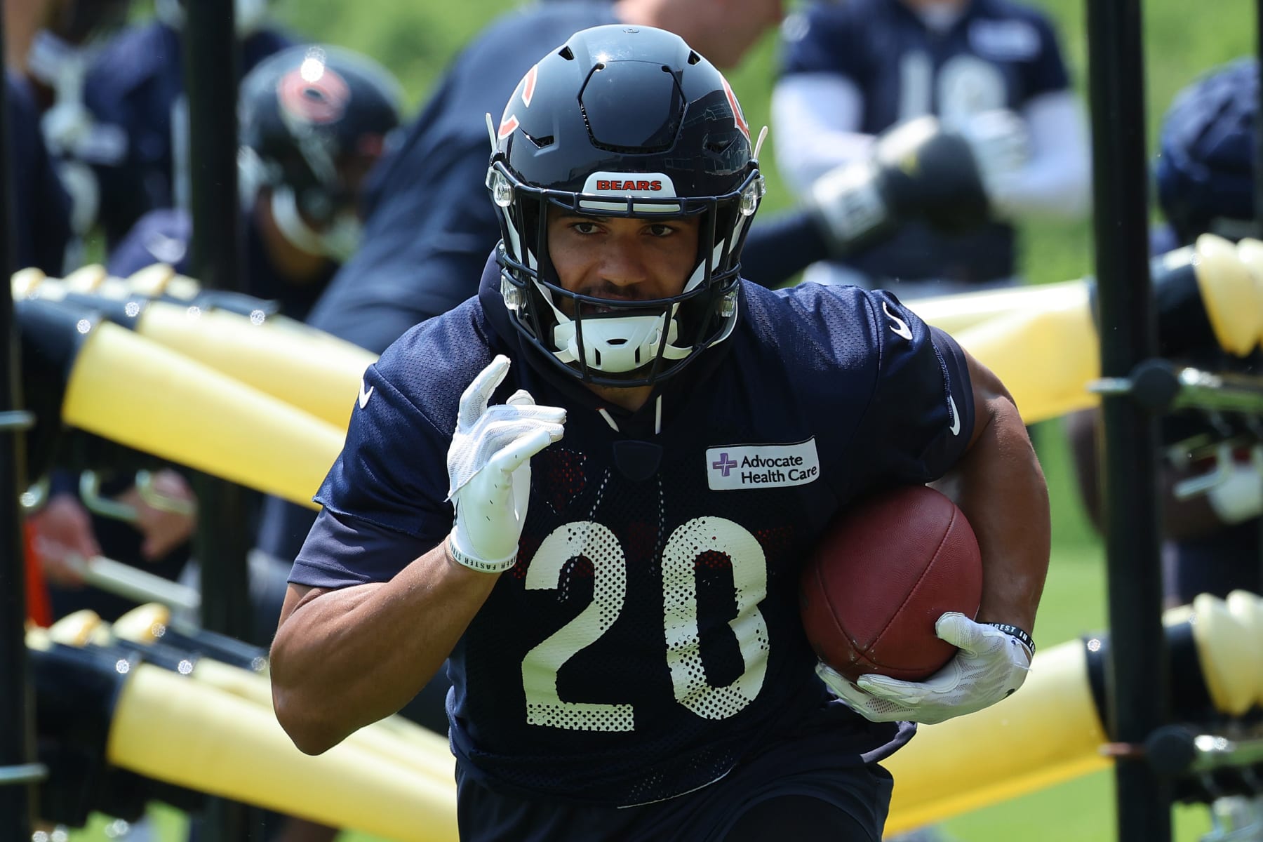 LAKE FOREST, ILLINOIS - JUNE 07: Travis Homer #20 of the Chicago Bears takes part in a drill during OTA's at Halas Hall on June 07, 2023 in Lake Forest, Illinois. (Photo by Michael Reaves/Getty Images)