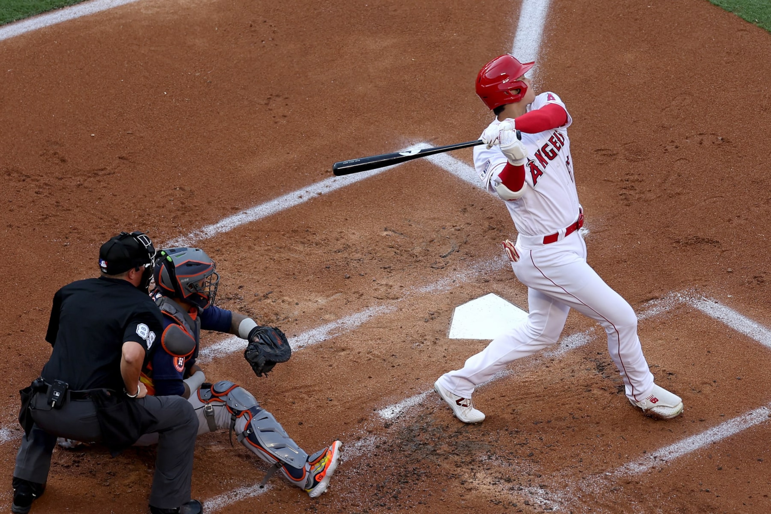 ANAHEIM, CALIFORNIA - JULY 15: Shohei Ohtani #17 of the Los Angeles Angels strikes out during the first inning of a game against the Houston Astros at Angel Stadium of Anaheim on July 15, 2023 in Anaheim, California. (Photo by Sean M. Haffey/Getty Images) ANAHEIM, CALIFORNIA - JULY 15: Shohei Ohtani #17 of the Los Angeles Angels strikes out during the first inning of a game against the Houston Astros at Angel Stadium of Anaheim on July 15, 2023 in Anaheim, California. (Photo by Sean M. Haffey/Getty Images)