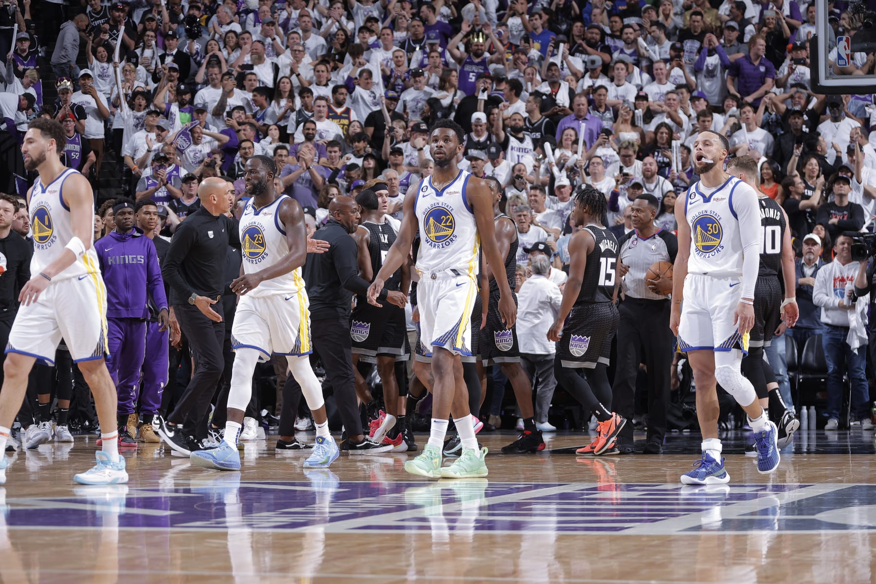 SACRAMENTO, CA - APRIL 15: Klay Thompson #11, Draymond Green #23, Andrew Wiggins #22, and Stephen Curry #30 of the Golden State Warriors walk to the bench during a timeout in a game against the Sacramento Kings during Round 1 Game 1 of the 2023 NBA Playoffs on April 15, 2023 at Golden 1 Center in Sacramento, California. NOTE TO USER: User expressly acknowledges and agrees that, by downloading and or using this photograph, User is consenting to the terms and conditions of the Getty Images Agreement. Mandatory Copyright Notice: Copyright 2023 NBAE (Photo by Rocky Widner/NBAE via Getty Images)