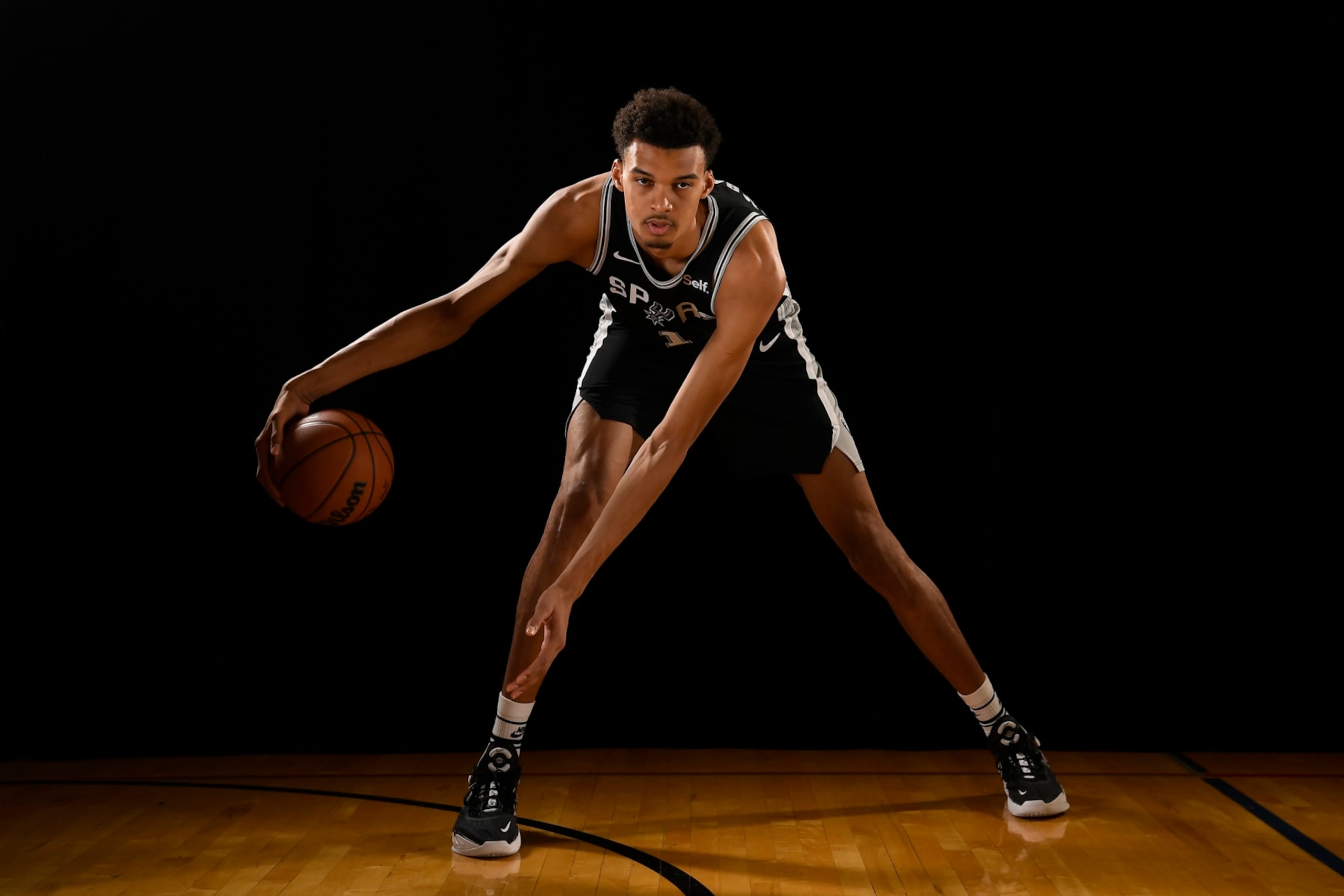 LAS VEGAS, NV - JULY 12: Victor Wembanyama #1 of the San Antonio Spurs for a portrait during the 2023 NBA Rookie Photo Shoot on July 12, 2023 at the University of Nevada, Las Vegas campus in Las Vegas, Nevada. NOTE TO USER: User expressly acknowledges and agrees that, by downloading and/or using this Photograph, user is consenting to the terms and conditions of the Getty Images License Agreement. Mandatory Copyright Notice: Copyright 2023 NBAE (Photo by Brian Babineau/NBAE via Getty Images)