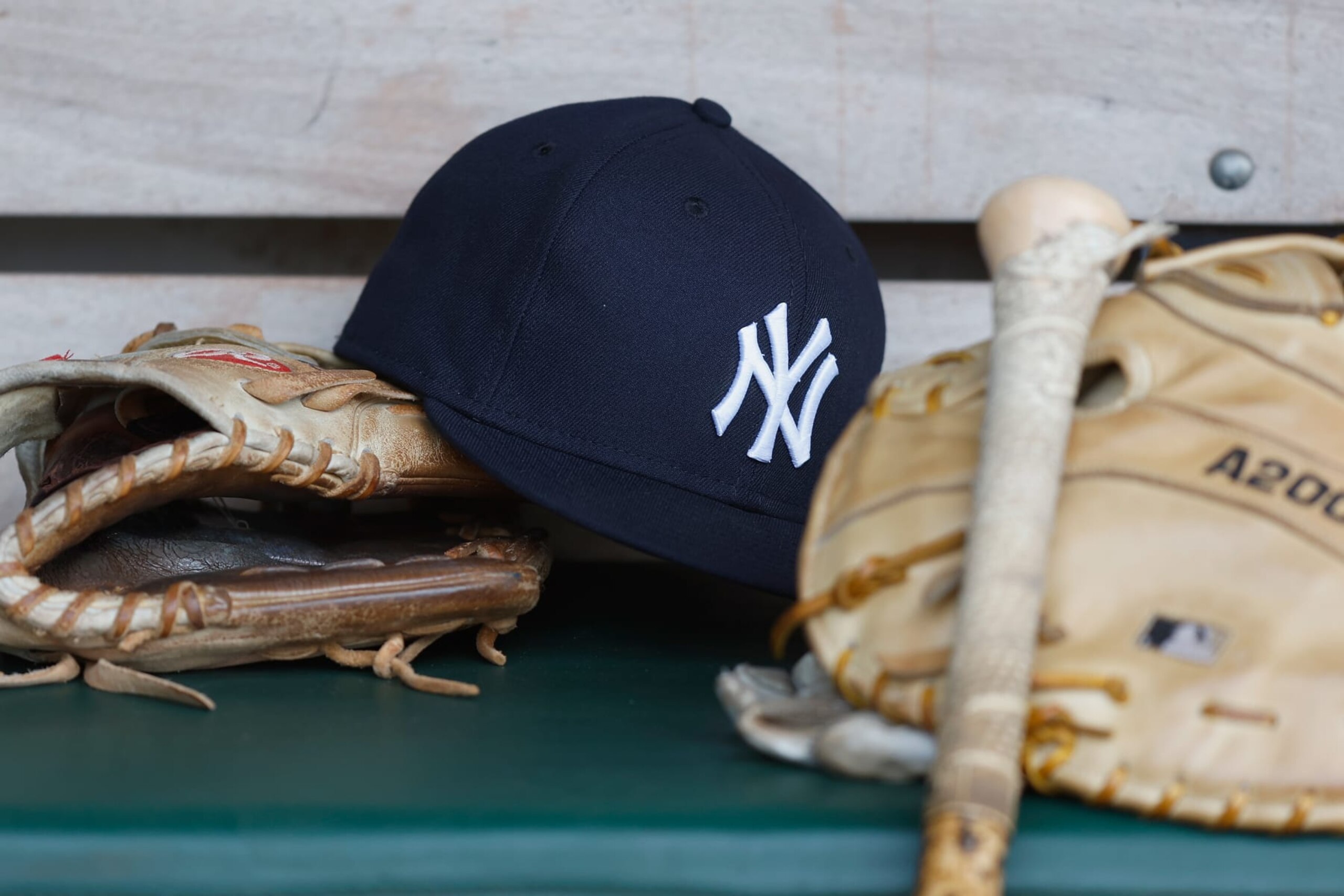 OAKLAND, CALIFORNIA - JUNE 27: A New York Yankees hat sits in the dugout before the game between the Oakland Athletics and the New York Yankees at RingCentral Coliseum on June 27, 2023 in Oakland, California. (Photo by Lachlan Cunningham/Getty Images)