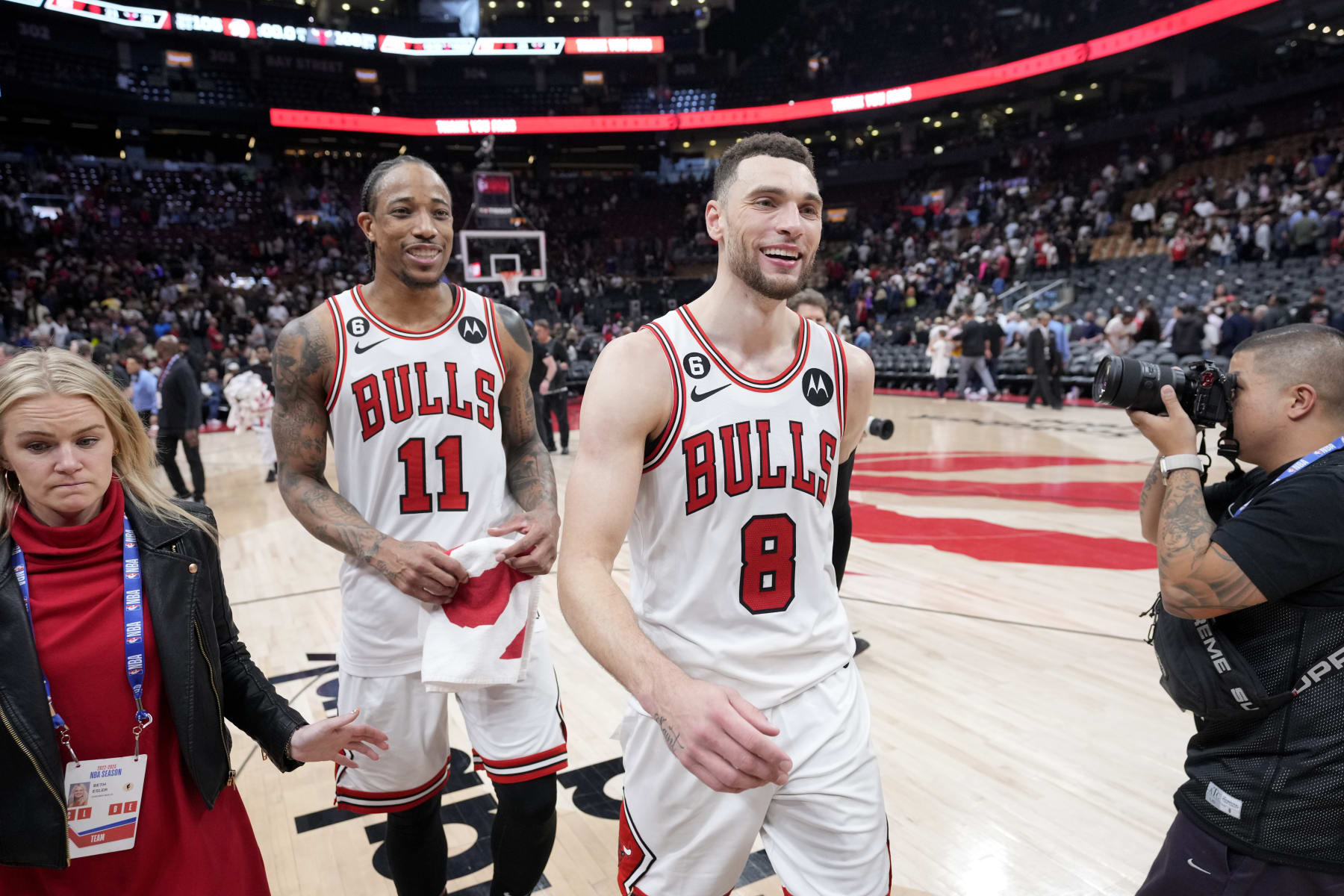 TORONTO, CANADA - APRIL 12:  DeMar DeRozan #11 and Zach LaVine #8 of the Chicago Bulls smile after the game against the Toronto Raptors during the 2023 Play-In Tournament on April 12, 2023 at the Scotiabank Arena in Toronto, Ontario, Canada.  NOTE TO USER: User expressly acknowledges and agrees that, by downloading and or using this Photograph, user is consenting to the terms and conditions of the Getty Images License Agreement.  Mandatory Copyright Notice: Copyright 2022 NBAE (Photo by Mark Blinch/NBAE via Getty Images)