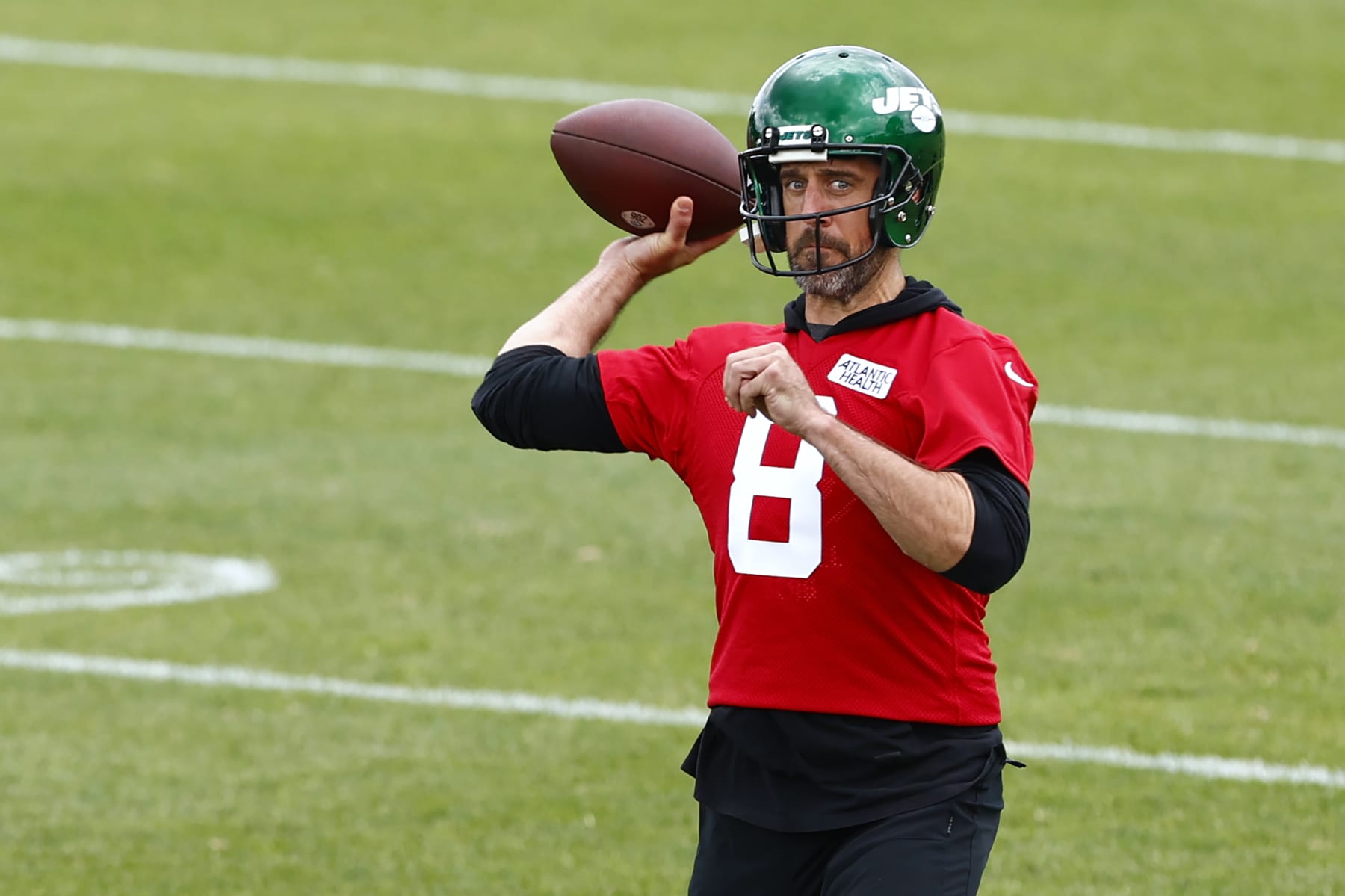 FLORHAM PARK, NEW JERSEY - JUNE 9: Quarterback Aaron Rodgers #8 of the New York Jets attempts a pass during the team's OTA's at Atlantic Health Jets Training Center on June 9, 2023 in Florham Park, New Jersey. (Photo by Rich Schultz/Getty Images)
