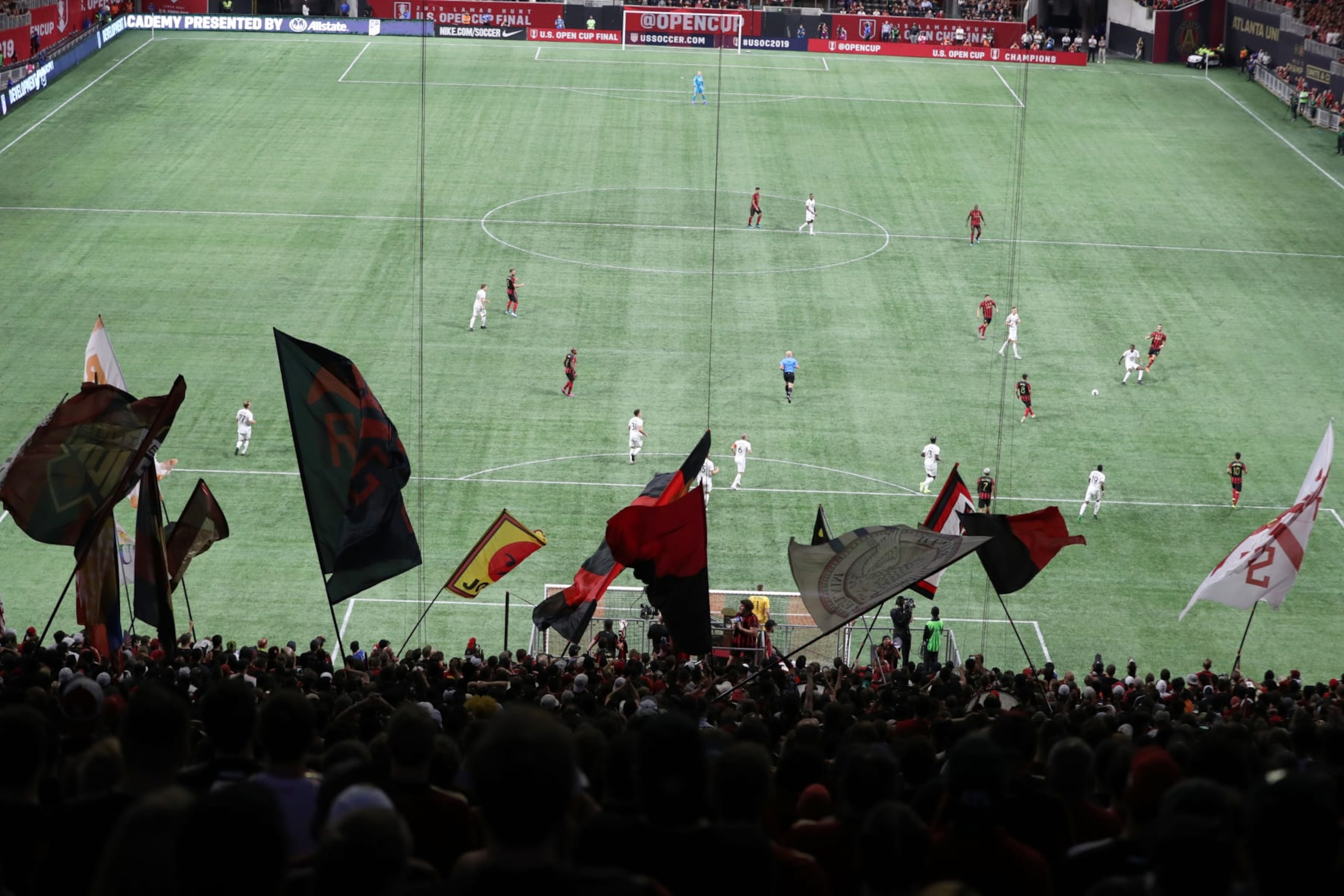 MLS Soccer: US Open Cup Final: Aerial view of Atlanta United vs Minnesota United action at Mercedes-Benz Stadium. Fans in the foreground waving flags and banners.
Atlanta, GA 8/27/2019
CREDIT: Simon Bruty (Photo by Simon Bruty /Sports Illustrated/Getty Images)
(Set Number: X162844 TK1 )