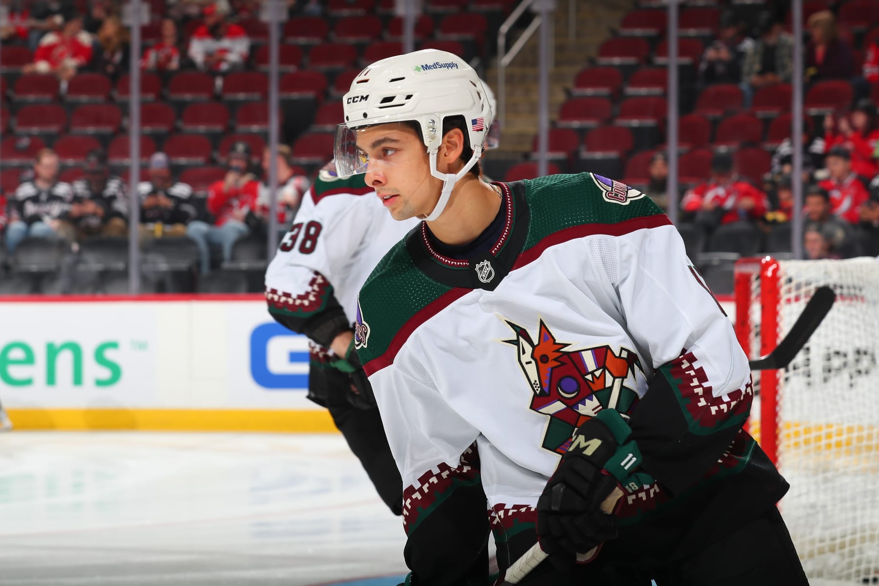 NEWARK, NJ - NOVEMBER 12:  Dylan Guenther #11 of the Arizona Coyotes warms up prior to the game  against the New Jersey Devils on November 12, 2022 at the Prudential Center in Newark, New Jersey.  (Photo by Rich Graessle/NHLI via Getty Images)