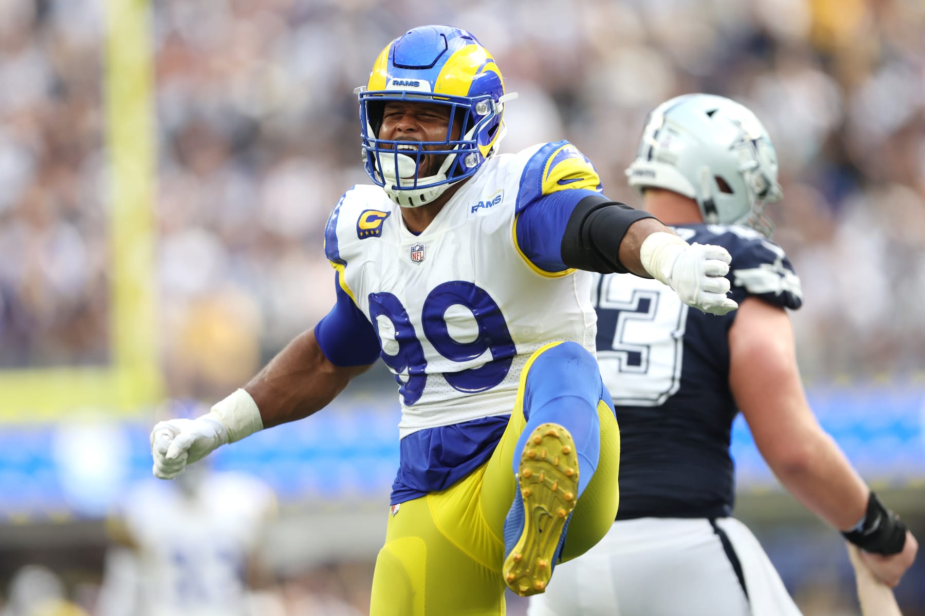 INGLEWOOD, CALIFORNIA - OCTOBER 09: Aaron Donald #99 of the Los Angeles Rams reacts after a sack during the first half against the Dallas Cowboys at SoFi Stadium on October 09, 2022 in Inglewood, California. (Photo by Sean M. Haffey/Getty Images)