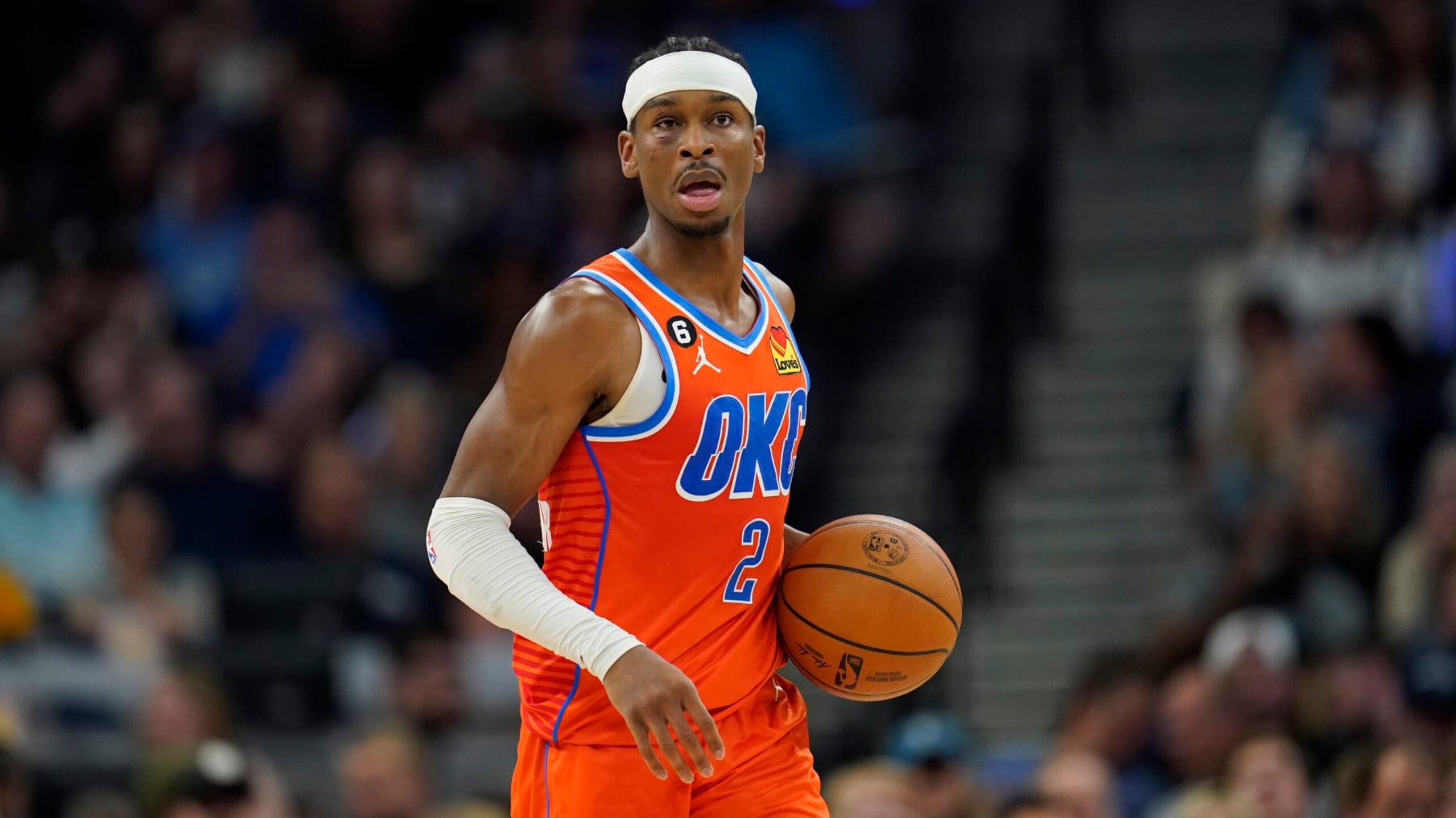 Oklahoma City Thunder guard Shai Gilgeous-Alexander (2) dribbles down the court during the second half of an NBA basketball play-in tournament game against the Minnesota Timberwolves, Friday, April 14, 2023, in Minneapolis. (AP Photo/Abbie Parr)