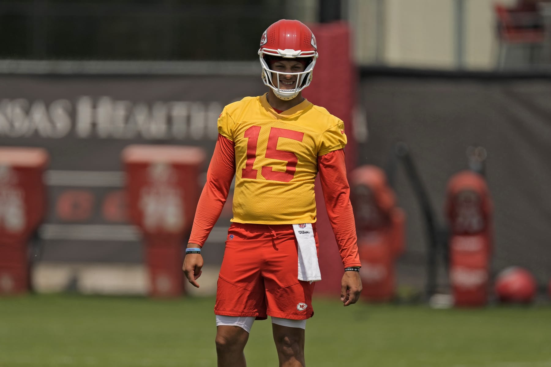 Kansas City Chiefs quarterback Patrick Mahomes (15) watches a drill during the NFL football team's organized team activities Thursday, June 1, 2023, in Kansas City, Mo. (AP Photo/Charlie Riedel)