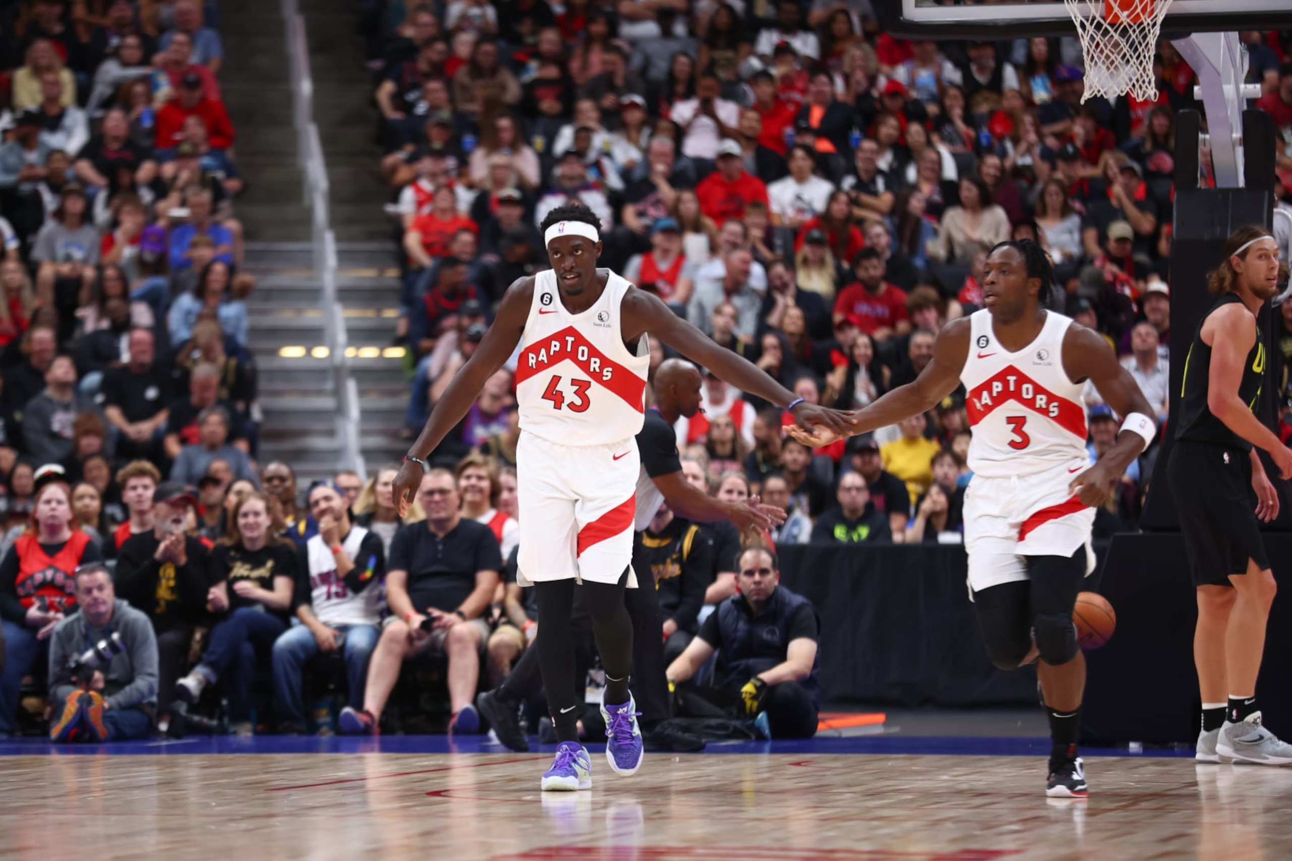 ALBERTA, CANADA - OCTOBER 2: Pascal Siakam #43 of the Toronto Raptors high fives OG Anunoby #3 of the Toronto Raptors during a preseason game on October 2, 2022 at the Rogers Place in Edmonton, Alberta, Canada.  NOTE TO USER: User expressly acknowledges and agrees that, by downloading and or using this Photograph, user is consenting to the terms and conditions of the Getty Images License Agreement.  Mandatory Copyright Notice: Copyright 2022 NBAE (Photo by Vaughn Ridley/NBAE via Getty Images)