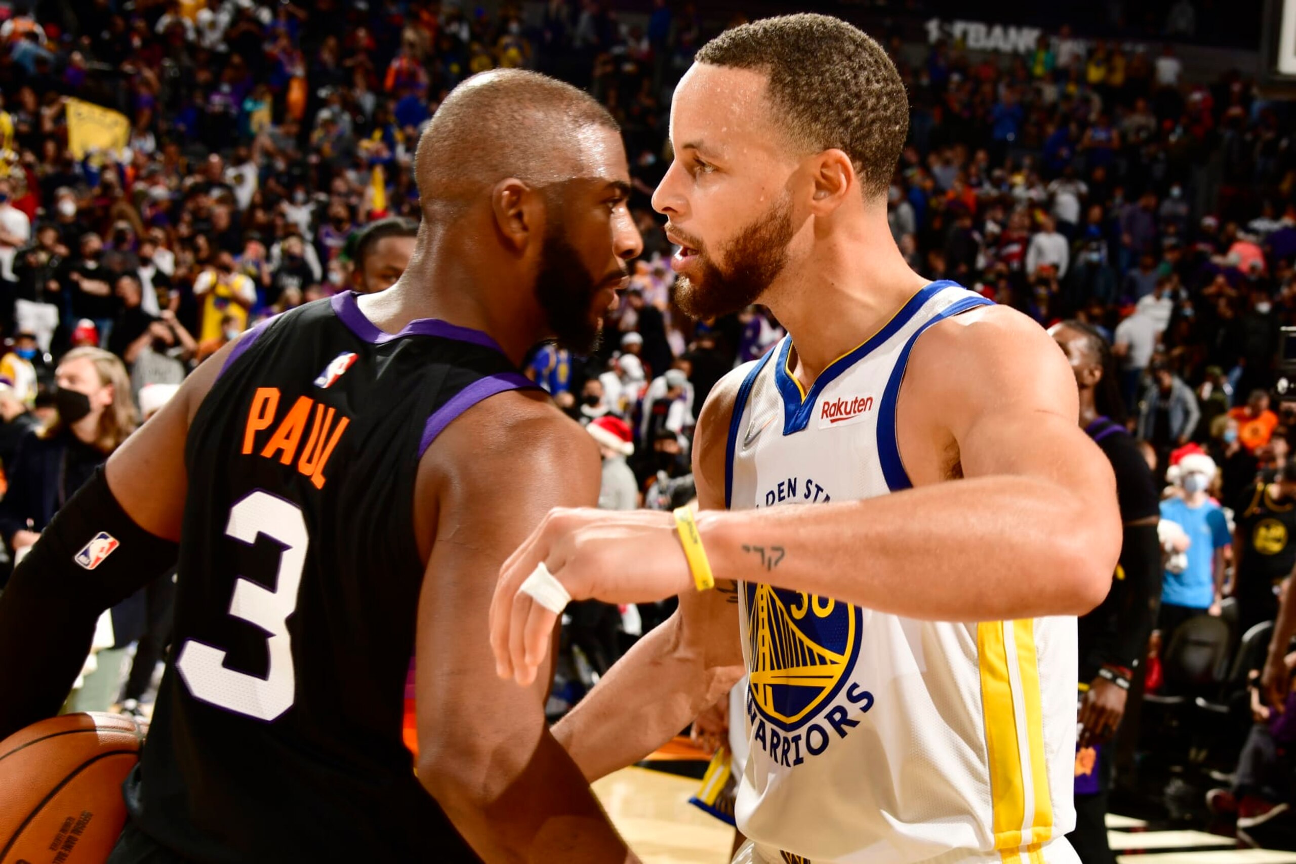 PHOENIX, AZ - DECEMBER 25: Chris Paul #3 of the Phoenix Suns hugs Stephen Curry #30 of the Golden State Warriors after the game on December 25, 2021 at Footprint Center in Phoenix, Arizona. NOTE TO USER: User expressly acknowledges and agrees that, by downloading and or using this photograph, user is consenting to the terms and conditions of the Getty Images License Agreement. Mandatory Copyright Notice: Copyright 2021 NBAE (Photo by Barry Gossage/NBAE via Getty Images) PHOENIX, AZ - DECEMBER 25: Chris Paul #3 of the Phoenix Suns hugs Stephen Curry #30 of the Golden State Warriors after the game on December 25, 2021 at Footprint Center in Phoenix, Arizona. NOTE TO USER: User expressly acknowledges and agrees that, by downloading and or using this photograph, user is consenting to the terms and conditions of the Getty Images License Agreement. Mandatory Copyright Notice: Copyright 2021 NBAE (Photo by Barry Gossage/NBAE via Getty Images)