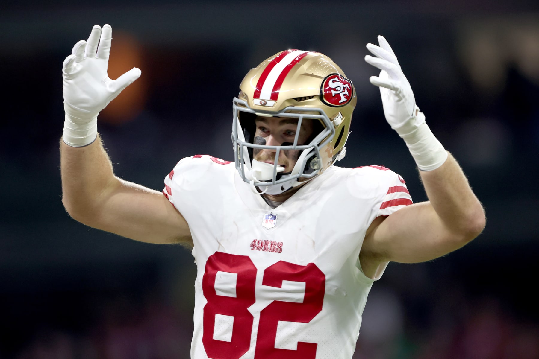 MEXICO CITY, MEXICO - NOVEMBER 21: Ross Dwelley #82 of the San Francisco 49ers reacts after a touchdown during the first half of a game against the Arizona Cardinals at Estadio Azteca on November 21, 2022 in Mexico City, Mexico. (Photo by Sean M. Haffey/Getty Images)